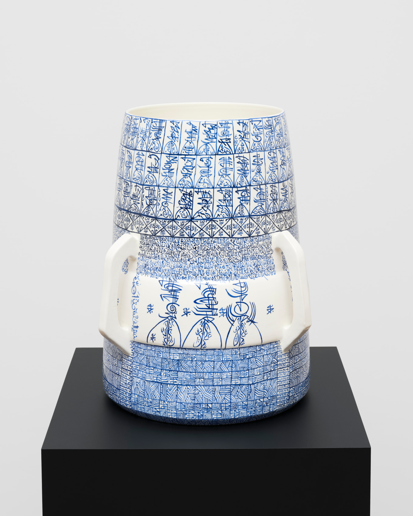 White ceramic with blue graphic patterns