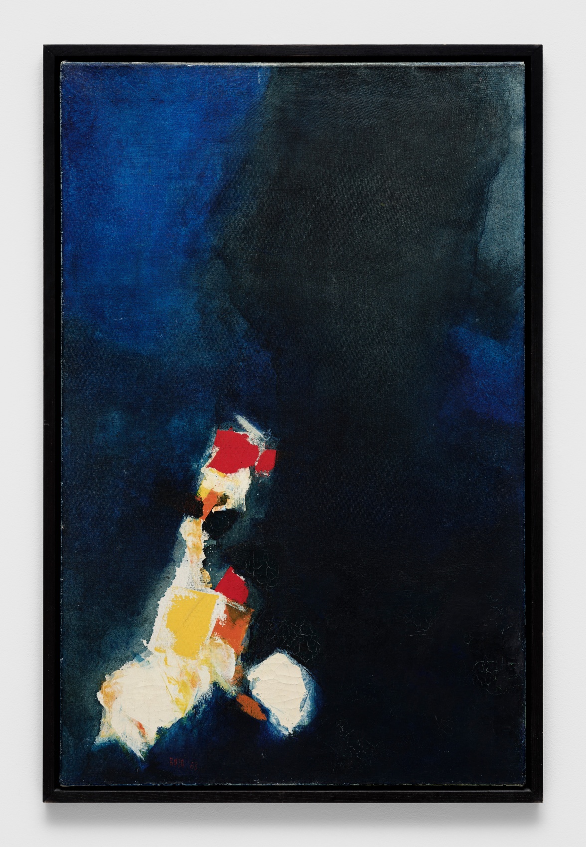 Abstract painting of white blobs in lower left corner on dark blue background