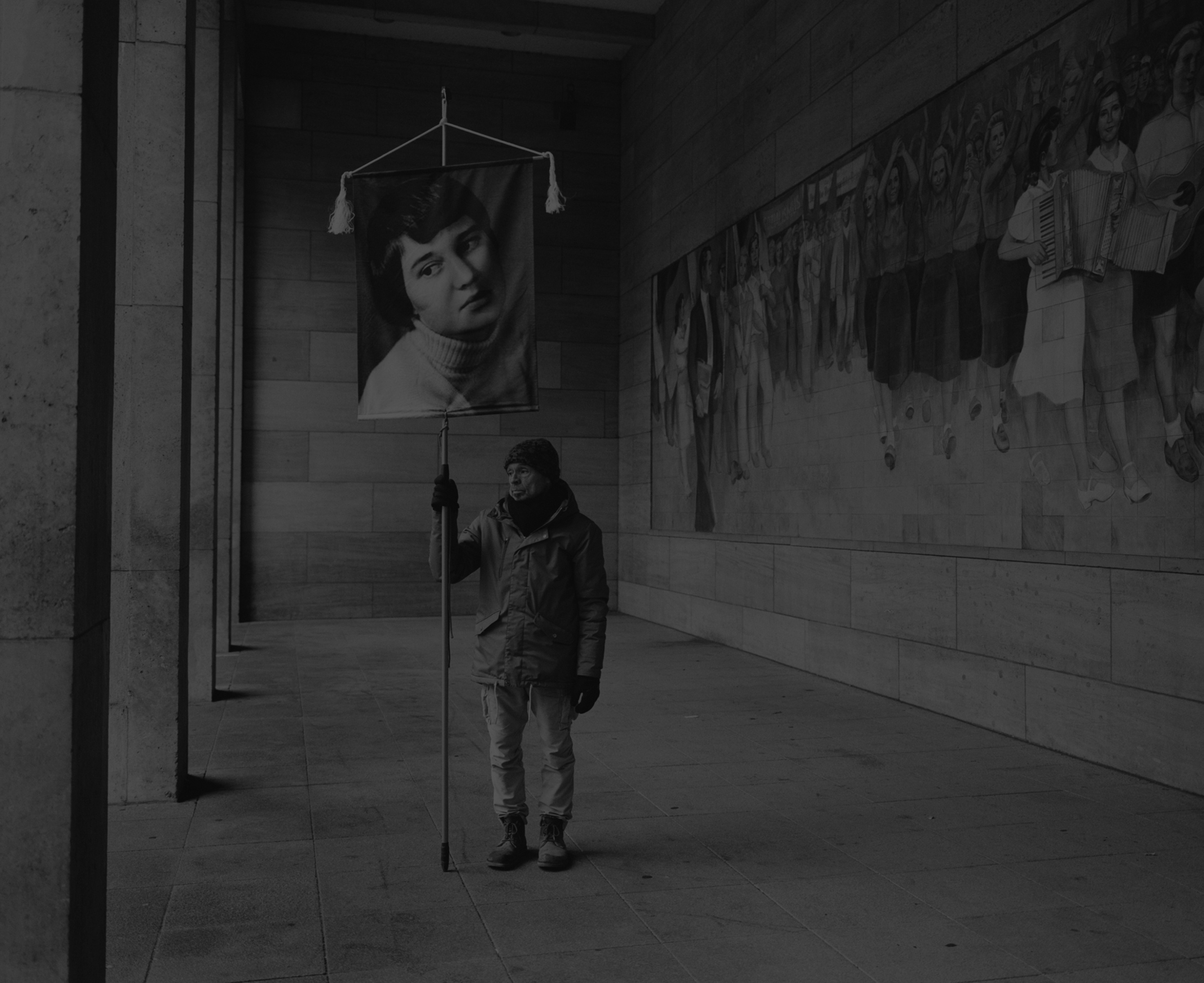 Daniel Joseph Martinez Leipzigerstraße at the Federal Ministry of Finance. What’s remarkable about this building and yet widely unknown is that on October 7th 1949 the GDR (DDR) was founded/constituted here. The mosaic by Max Linger is called “The buildup of a republic” (German: Aufbau der Republik) and is entirely made out of Germany’s well known Meißner porcelain., 2017 Medium format black & white film printed digitally on Hahnemule Fine Art Baryta, Gloss 315gsm 60 x 72 in (152.4 x 182.88 cm)