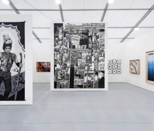 Installation view of Booth B24 at Untitled Miami 2019, featuring large works by Hugo Crosthwaite, photographs by Chris Engman and Ken Gonzales-Day, and video-paintings by Federico Solmi.