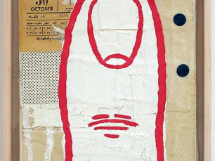 a large red and white finger made of paper