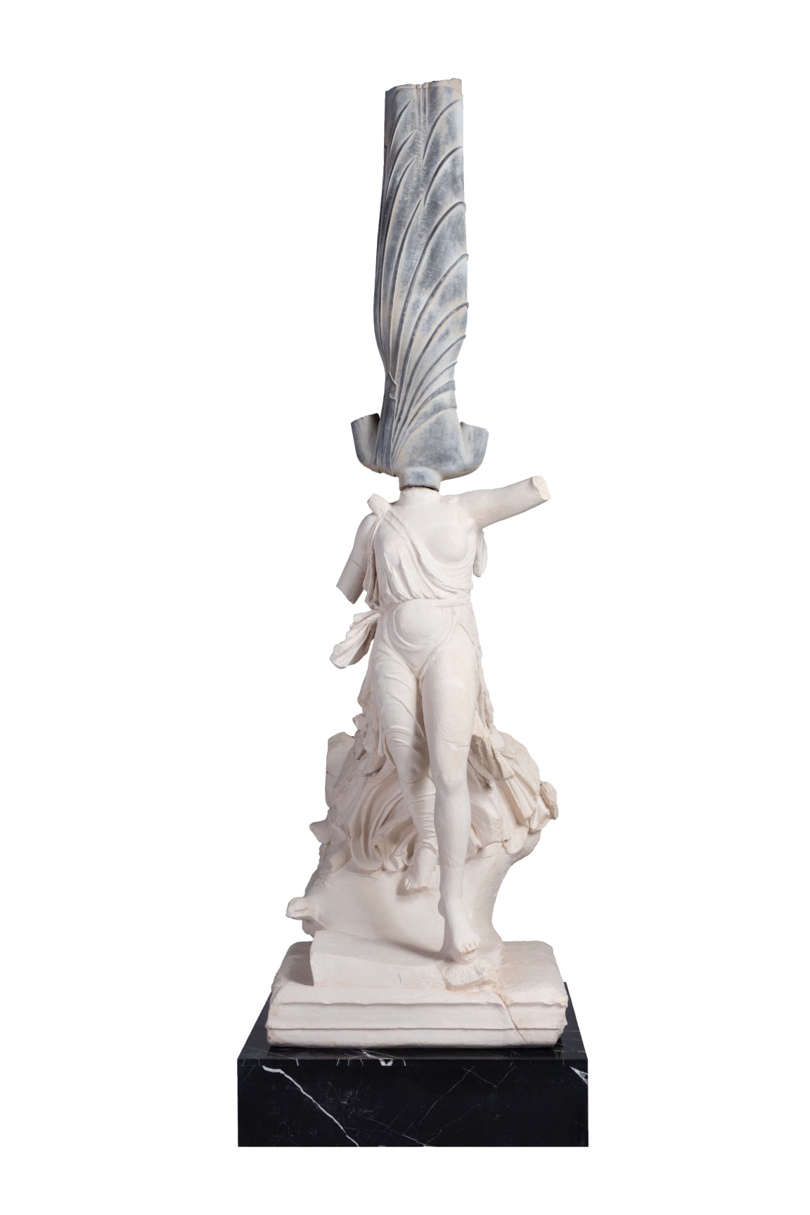 A statue that combines two figures, stacked atop each other, connected at the neck, with missing arms