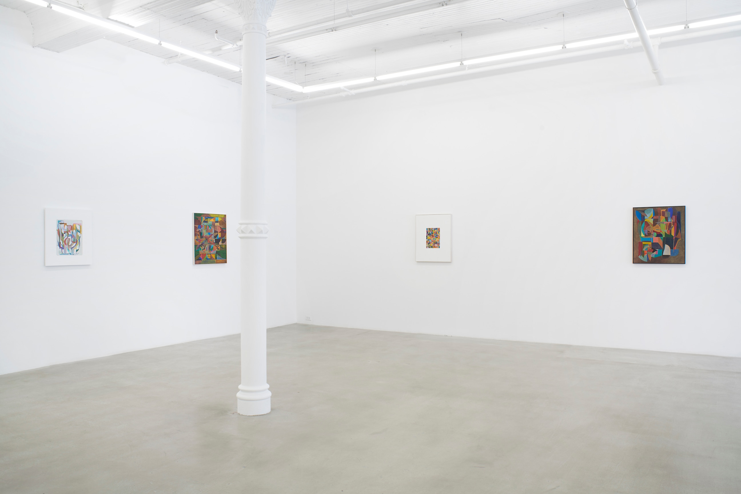 Installation view of four artworks