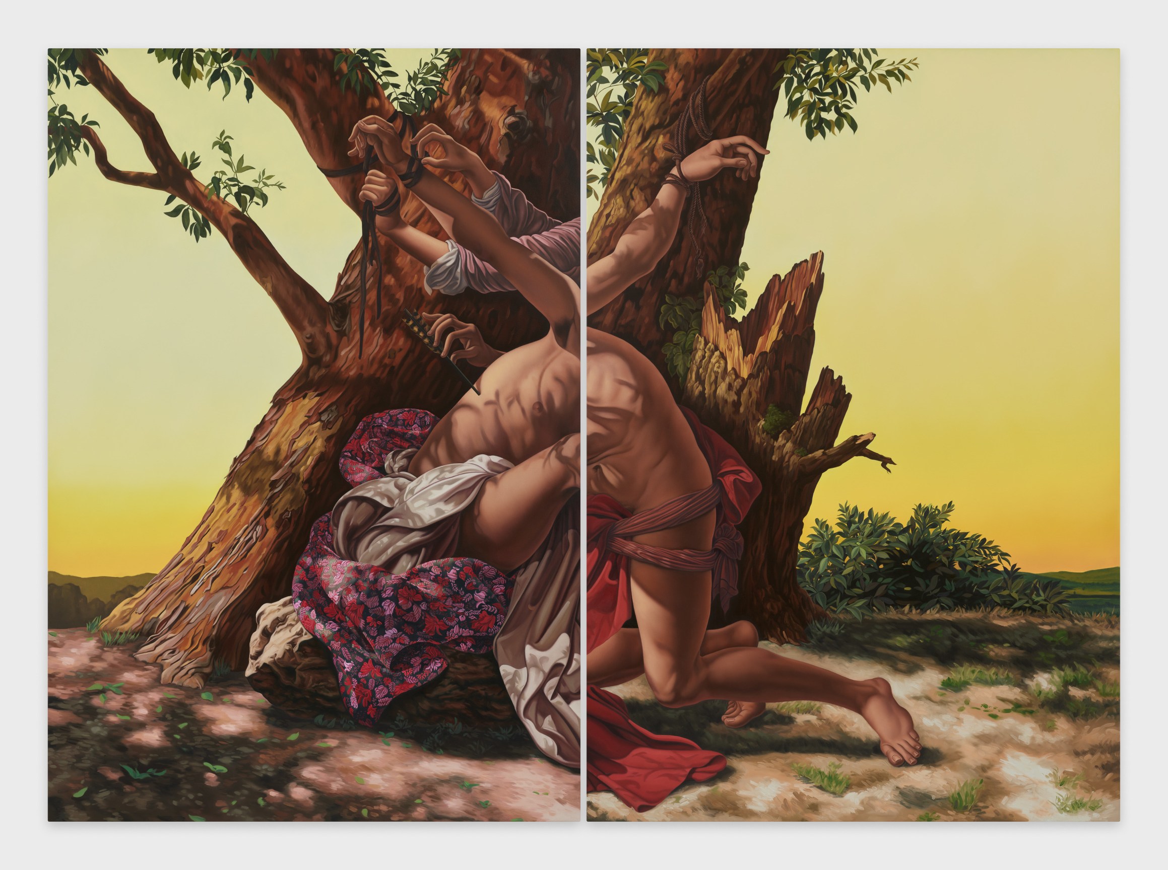 two headless bodies tied to a tree, lunging towards each other