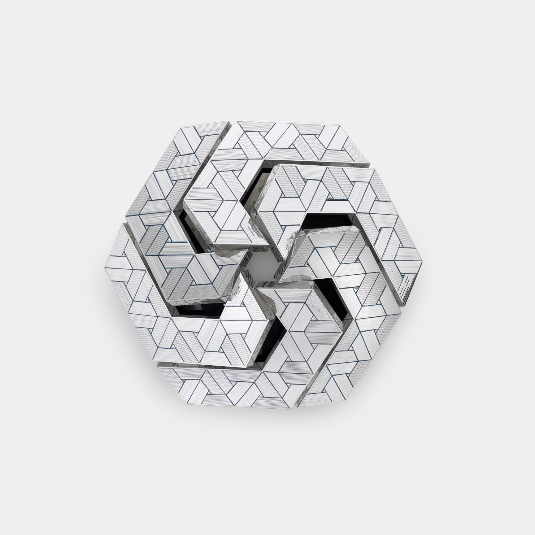 Geometric reverse mirror panel with painted details mounted to a wall by Monir Shahroudy Farmanfarmaian.