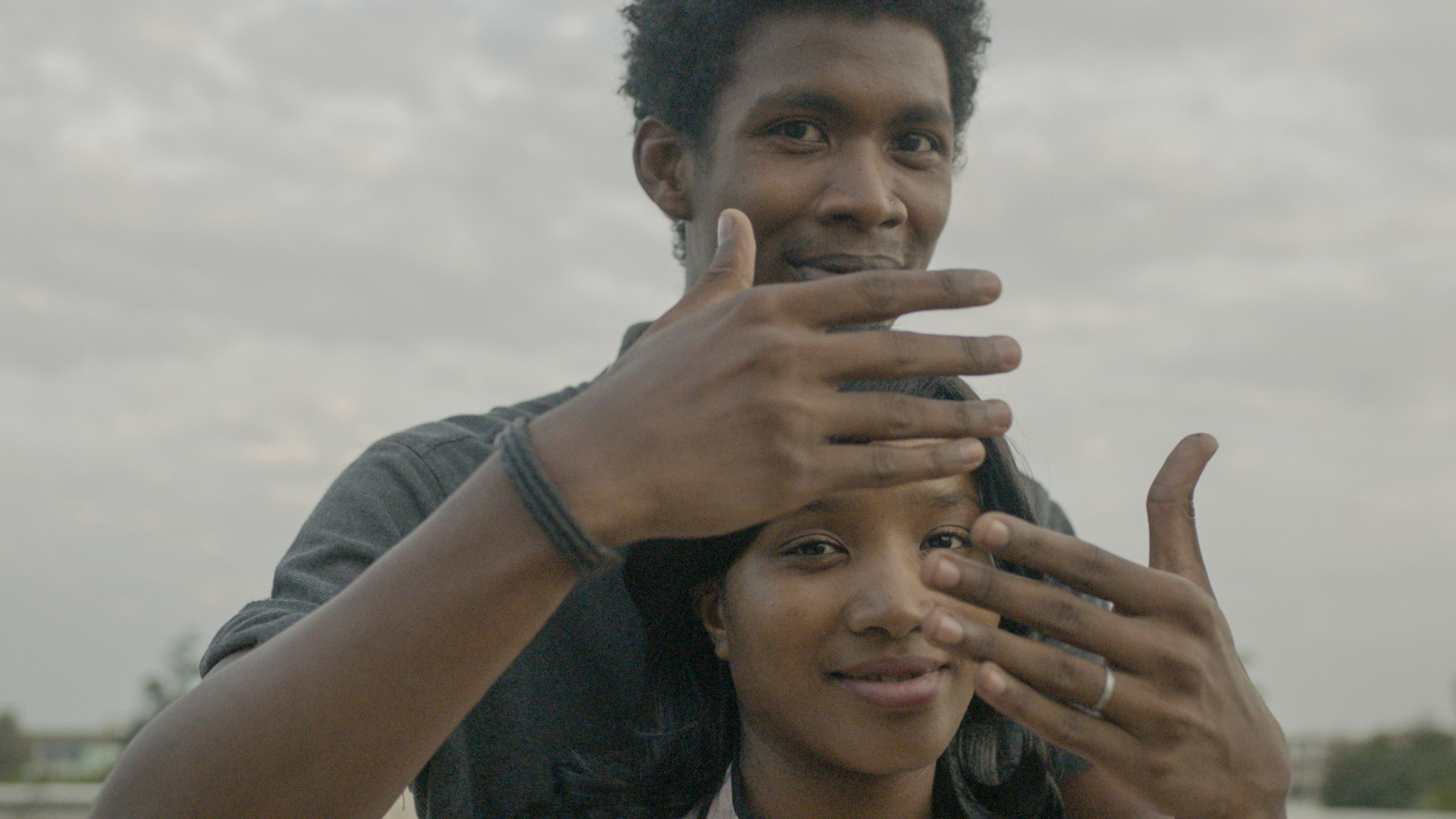 Video still of a man and woman in The Specter of Ancestors Becoming, 2019