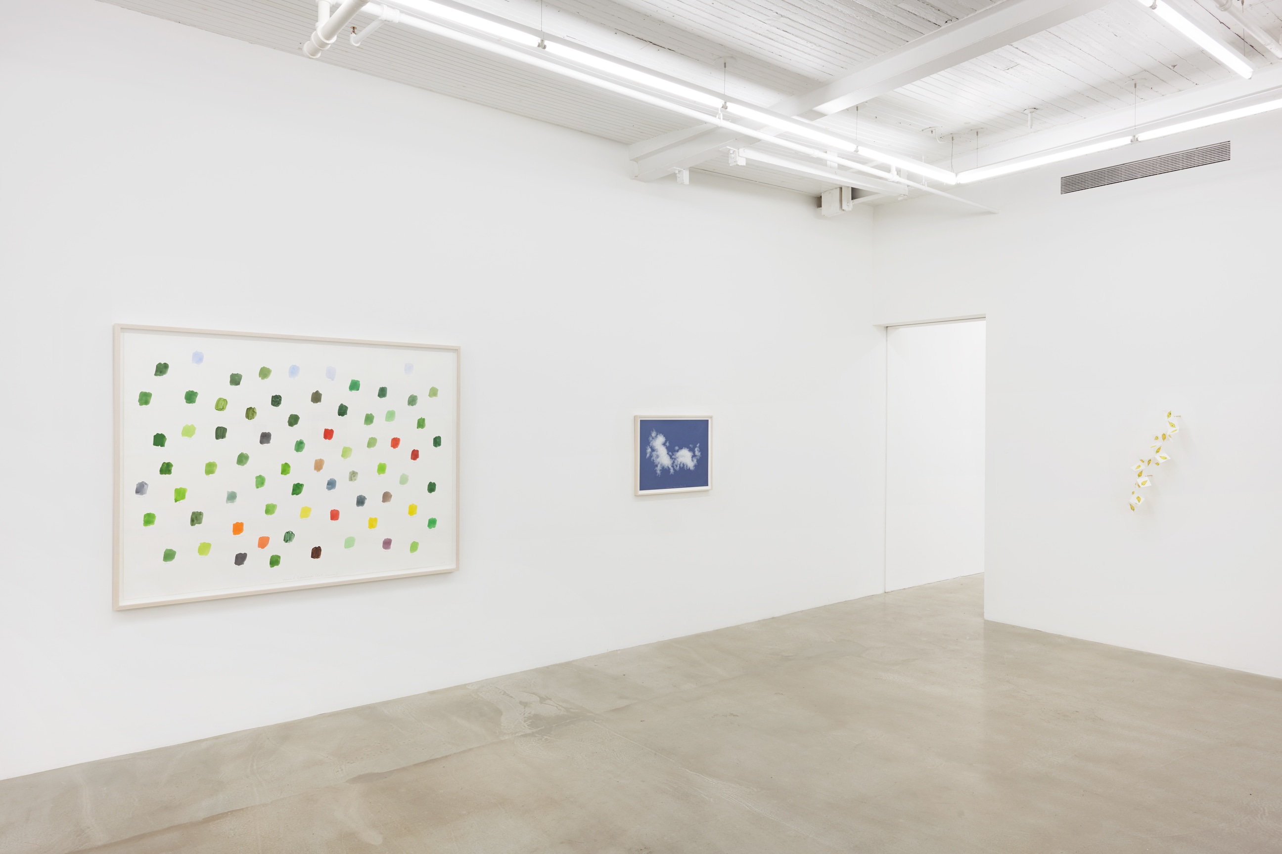Installation view of three artworks