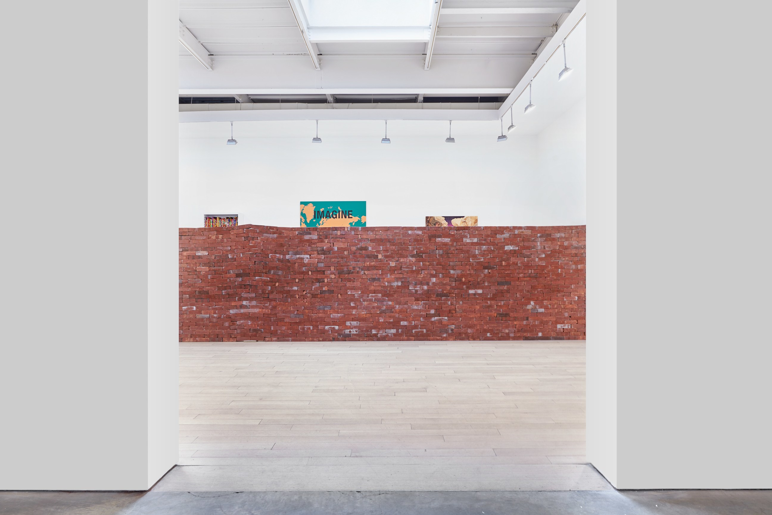 installation view of a brick wall