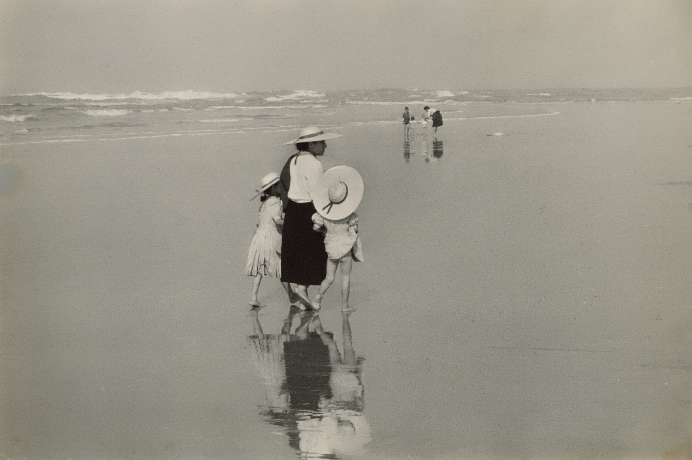 &Eacute;douard Boubat (French, 1923 &ndash; 1999), Family on beach, Minho, Portugal, c. 1950s