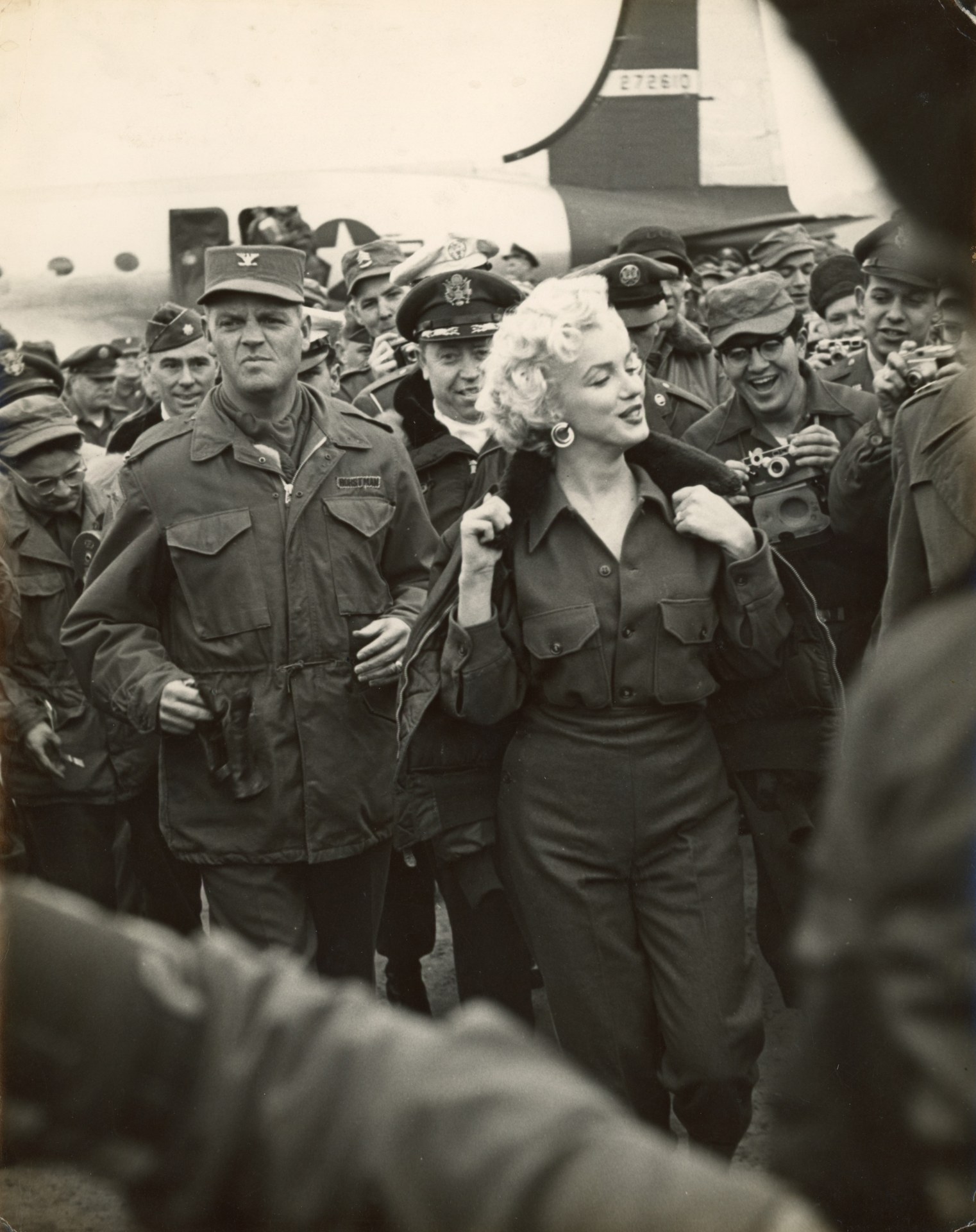 13. Ted Russell (American, b. 1930),&nbsp;Marilyn Monroe in Korea, 1954, Vintage Gelatin Silver Print, 14&rdquo; x 11&rdquo;