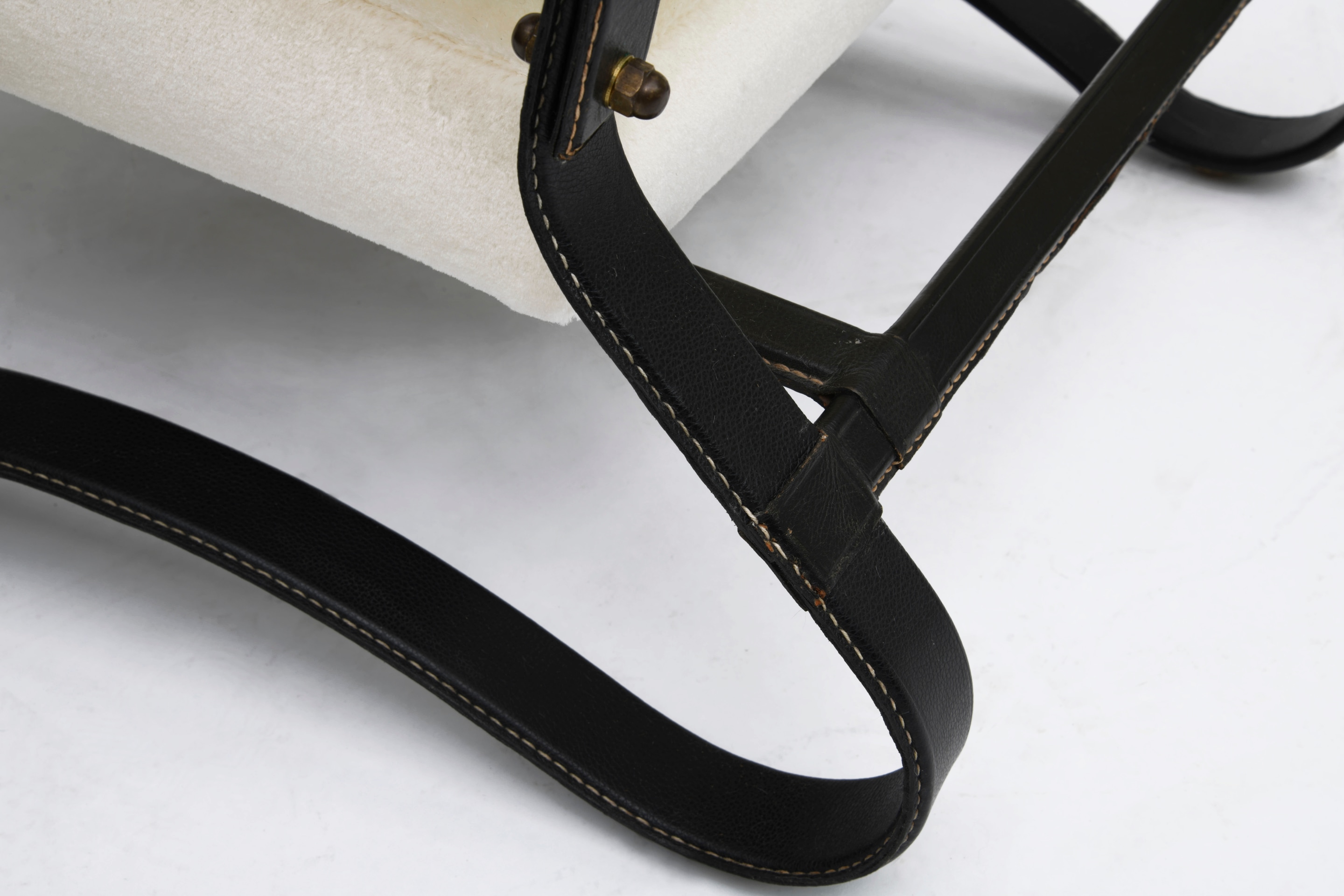 Jacques Adnet pair of armchairs leg detail