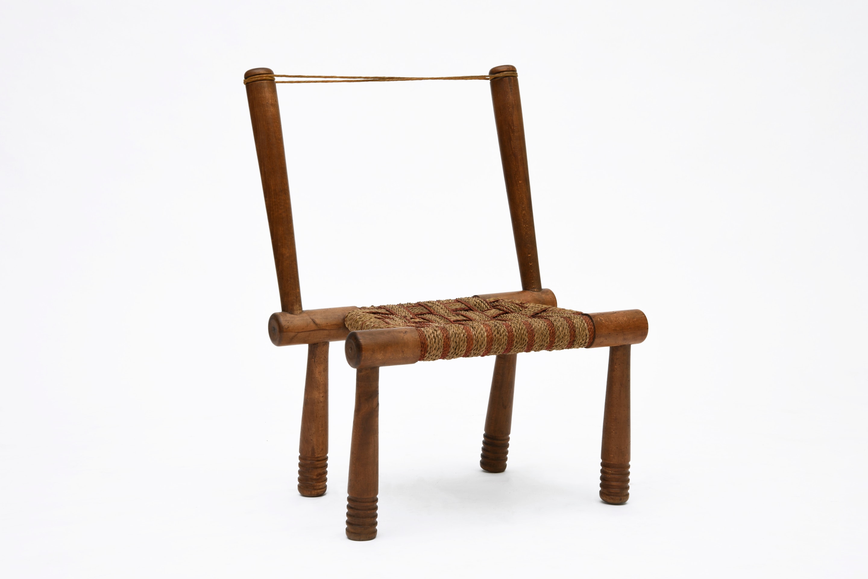 Gaston Castel's wooden chair diagonal view