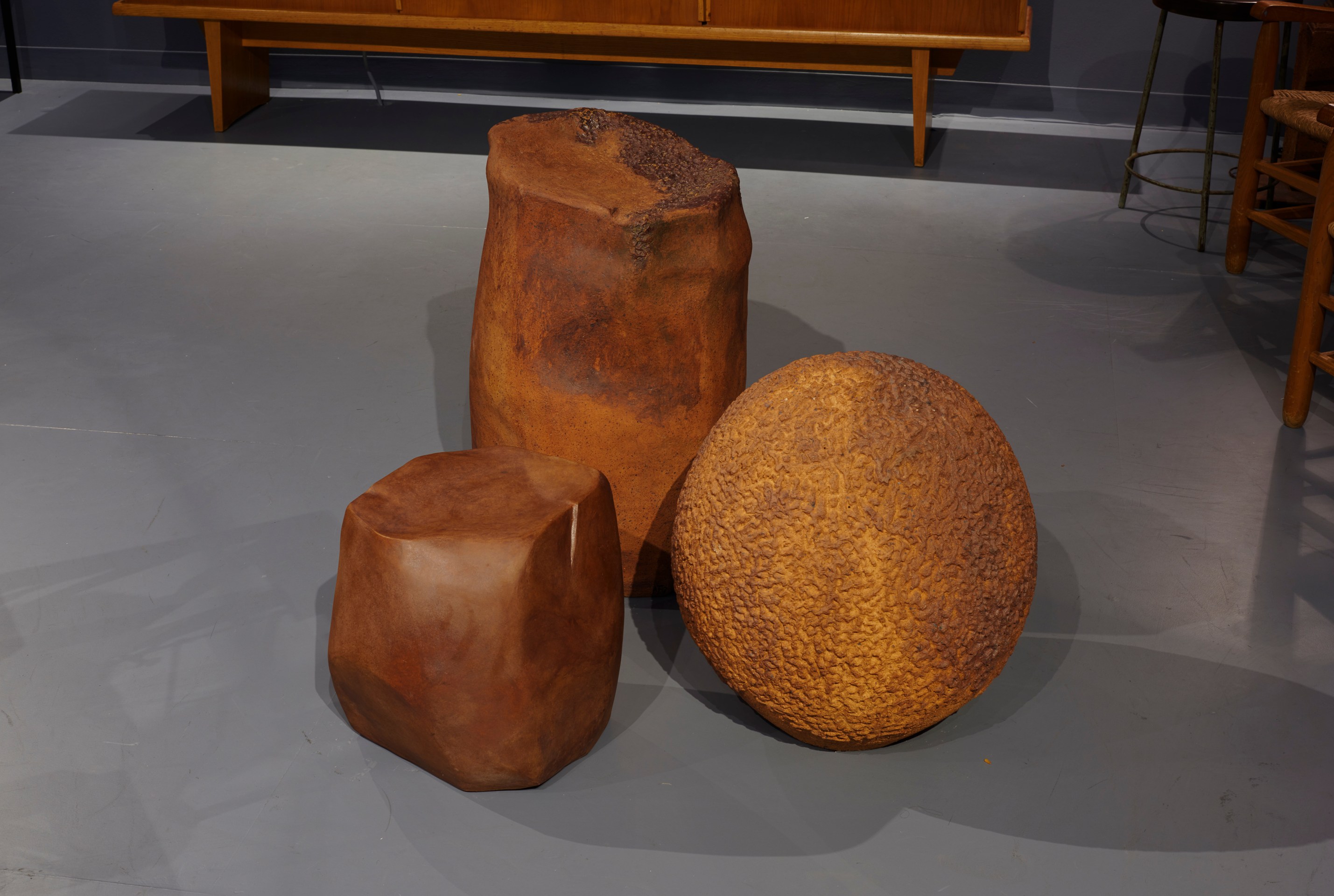 Magen H Gallery's booth at Design Miami, install image of a grouping of three Annie Fourmanoir's ceramic sculptures