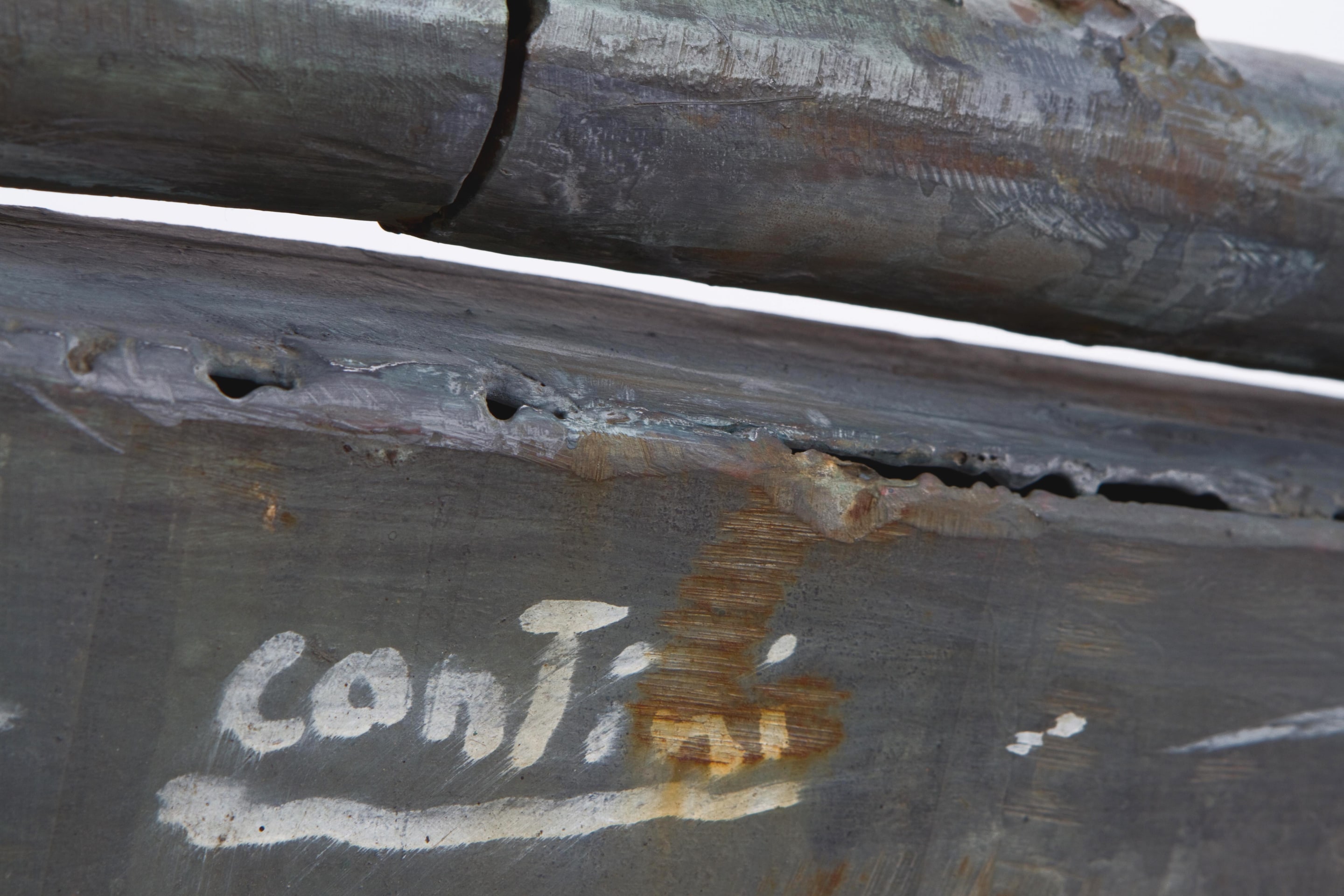 Sylvain Contini's sculptural bench detailed view of signature