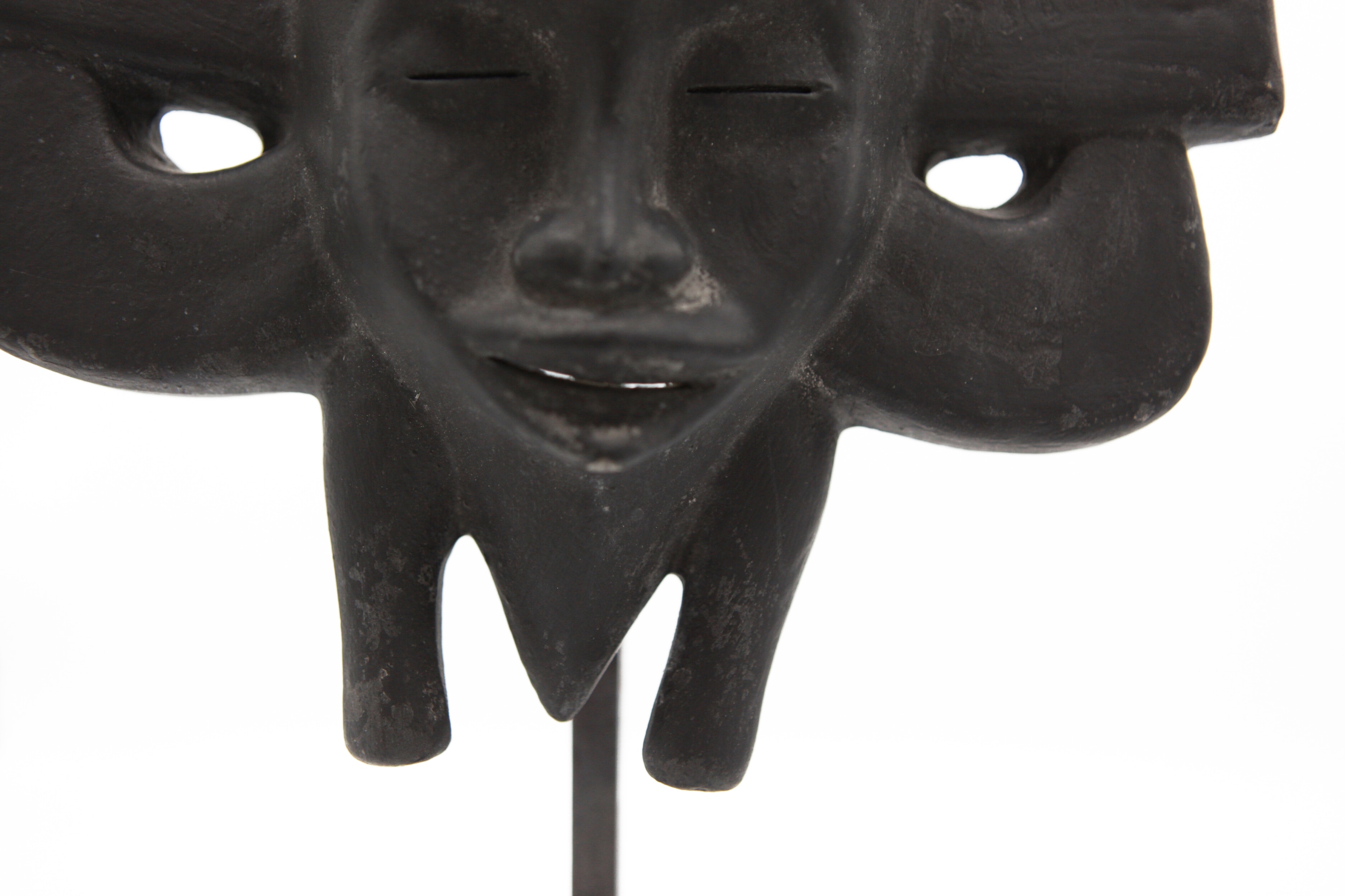 Roger Capron's ceramic mask detail view of face and bottom of mask