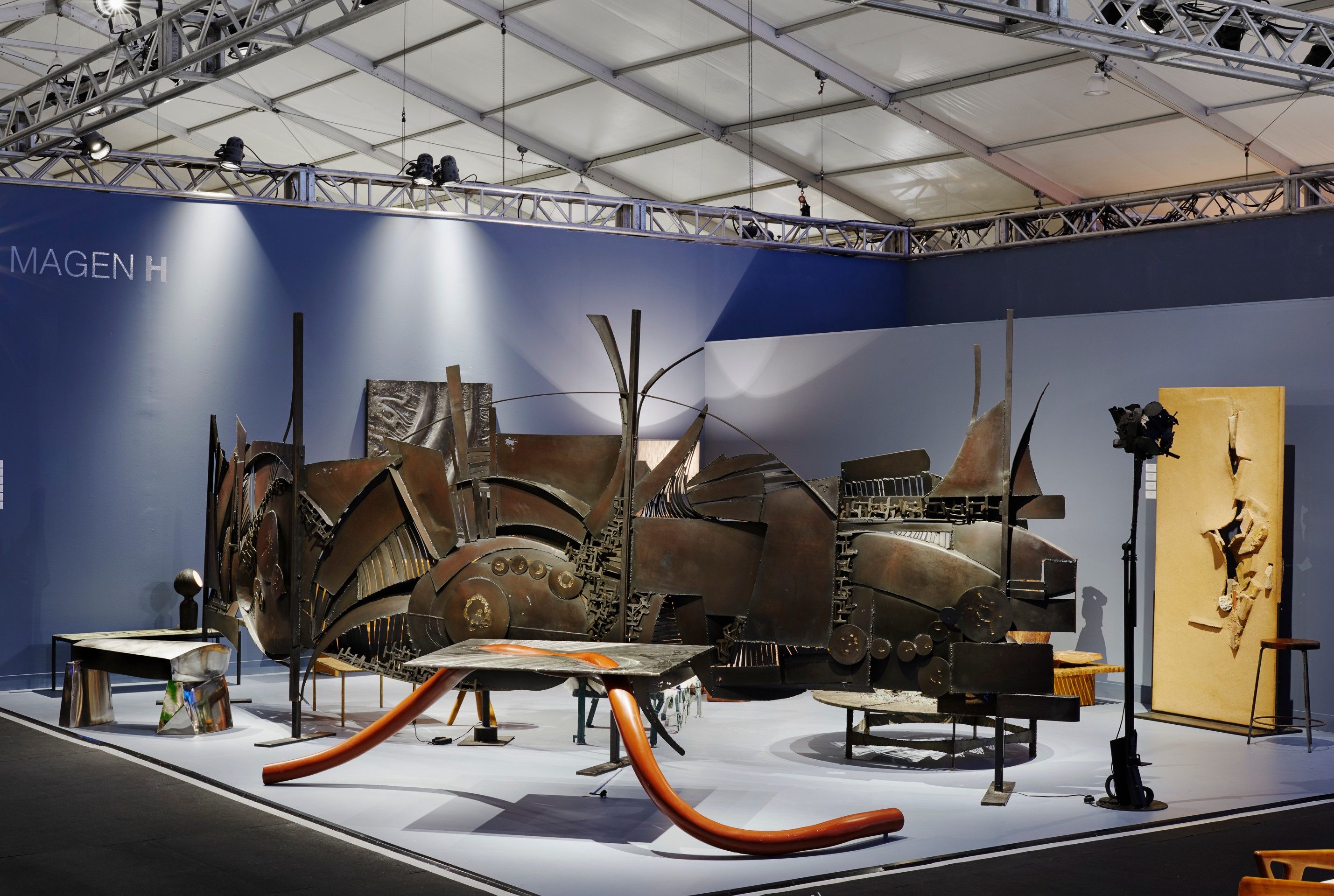 Magen H Gallery's booth at Design Miami, install image showing Forrest Myers' Atoll, and Jean Claude Delagneau's sculptural sreen