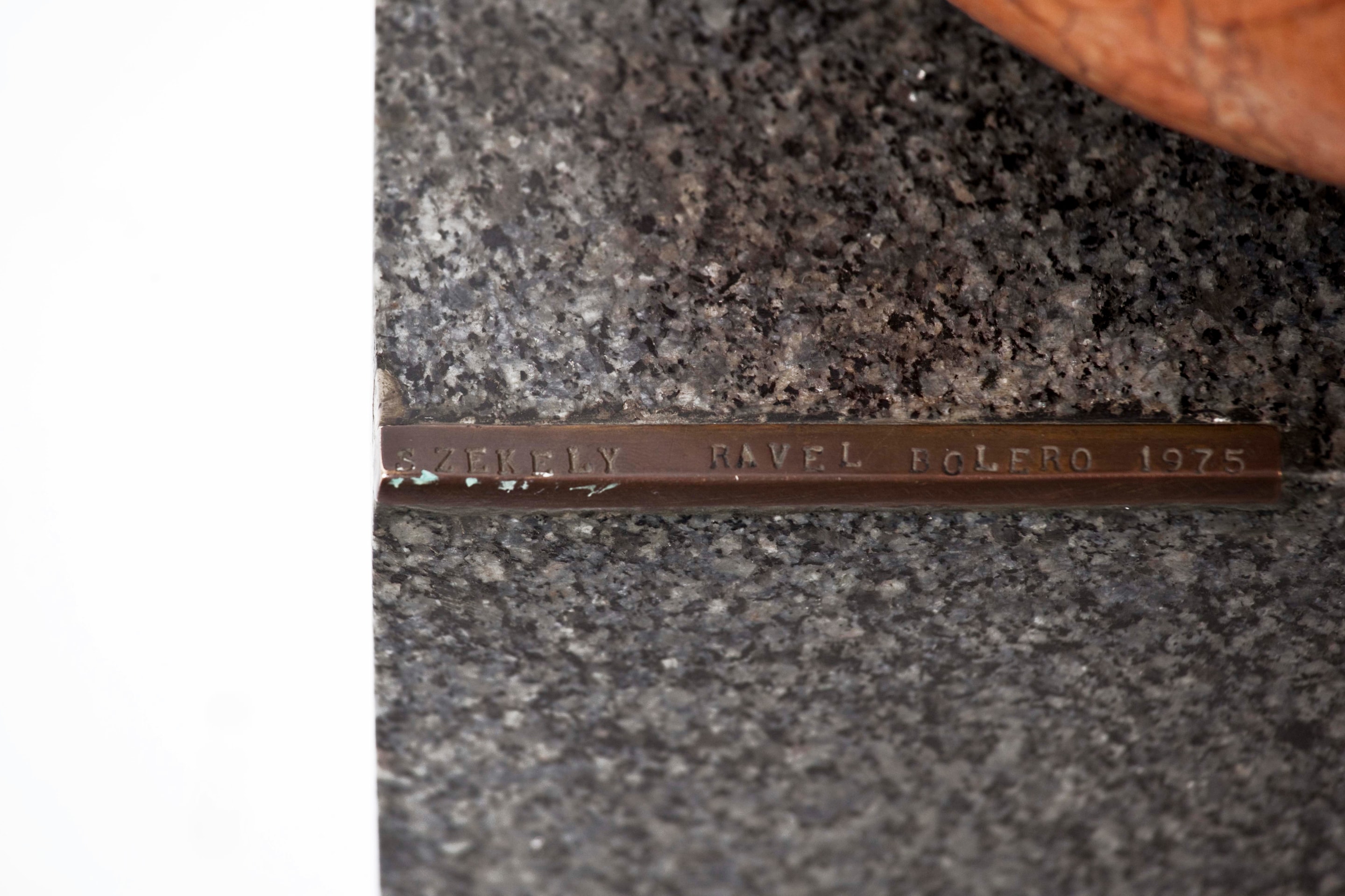 Pierre Székely's marble sculpture, detailed view of metal plate on base with title, date and signature