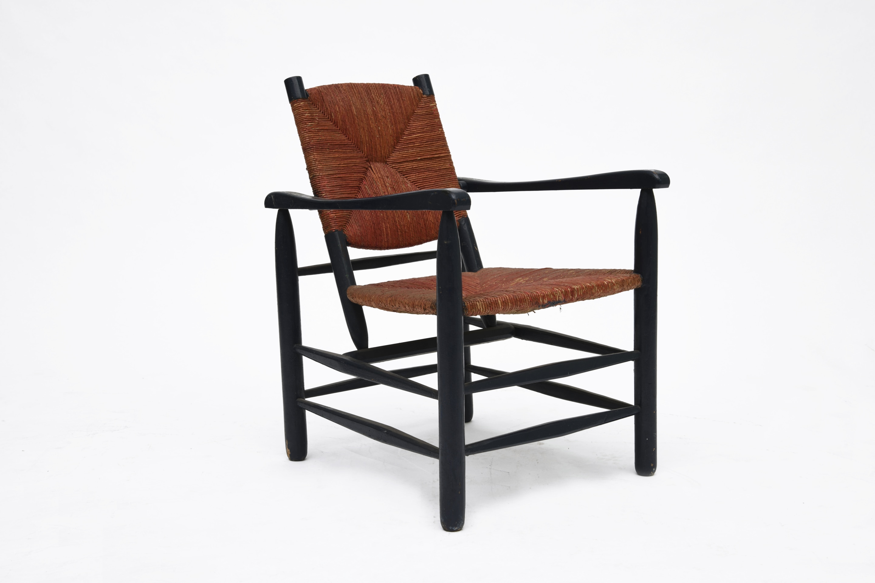 Charlotte Perriand's armchair, full diagonal view