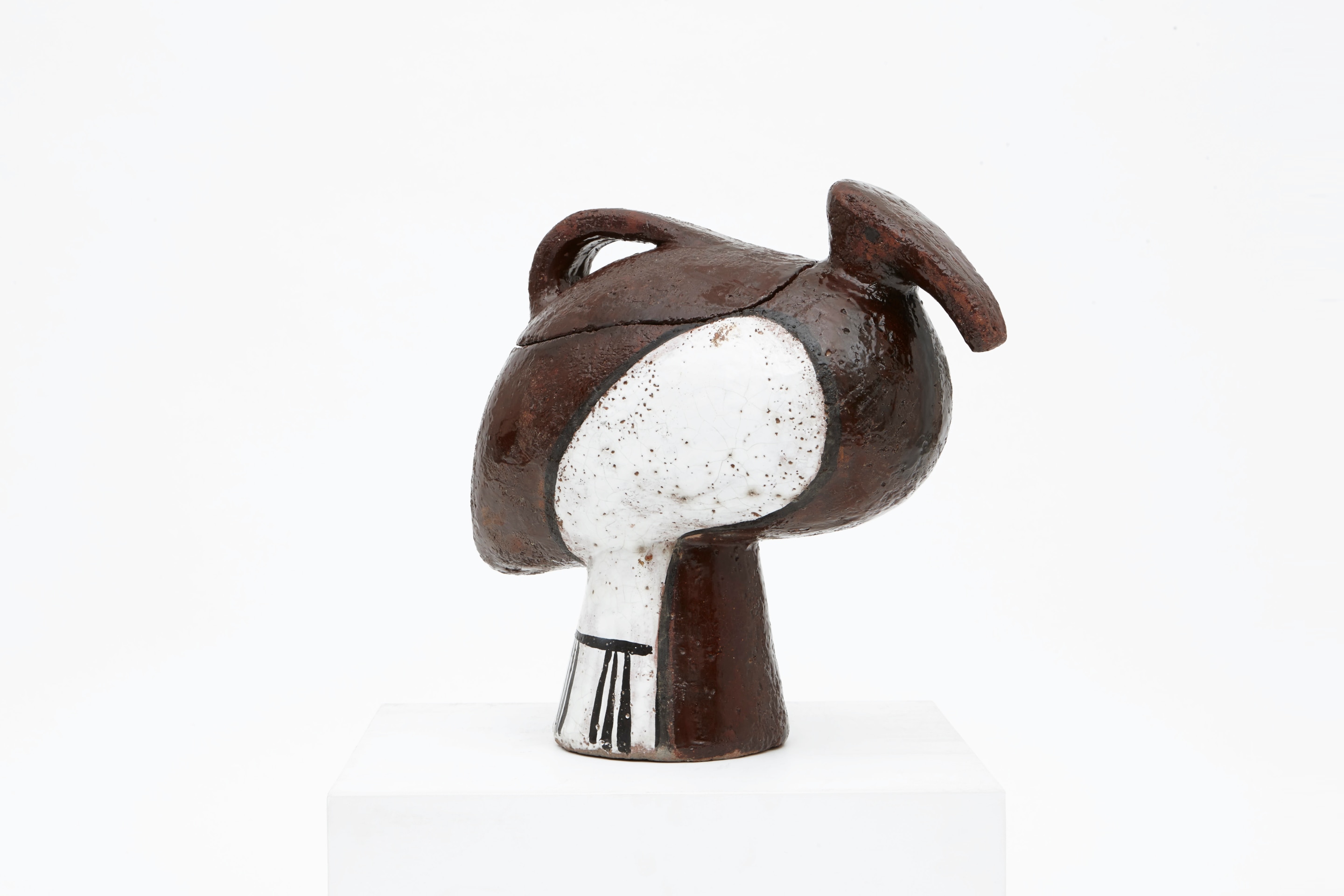 Jean Amado's ceramic pitcher with lid side view