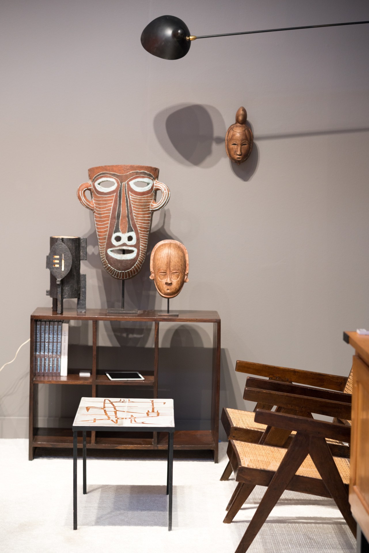 Bonnet's table lamp, Accolay's mask, Atelier Massier's mask,  Serge Mouille sconce, Jaque Sagan mask, Pierre Jeanneret's bookcase, Jean Rivier ceramic coffee table