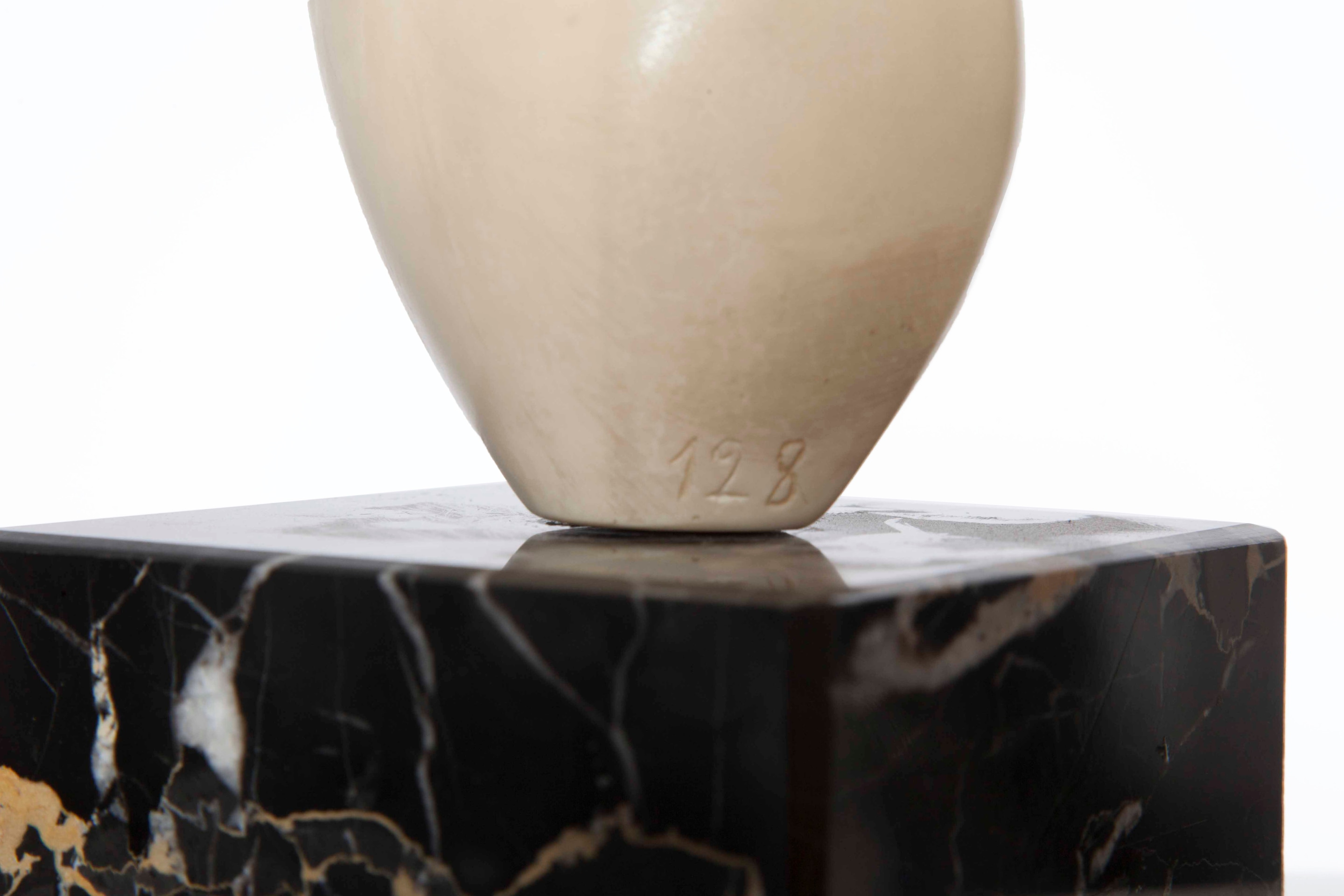 Antoine Poncet's marble and plaster sculpture, detailed view of marble base with an engraved &quot;128&quot;