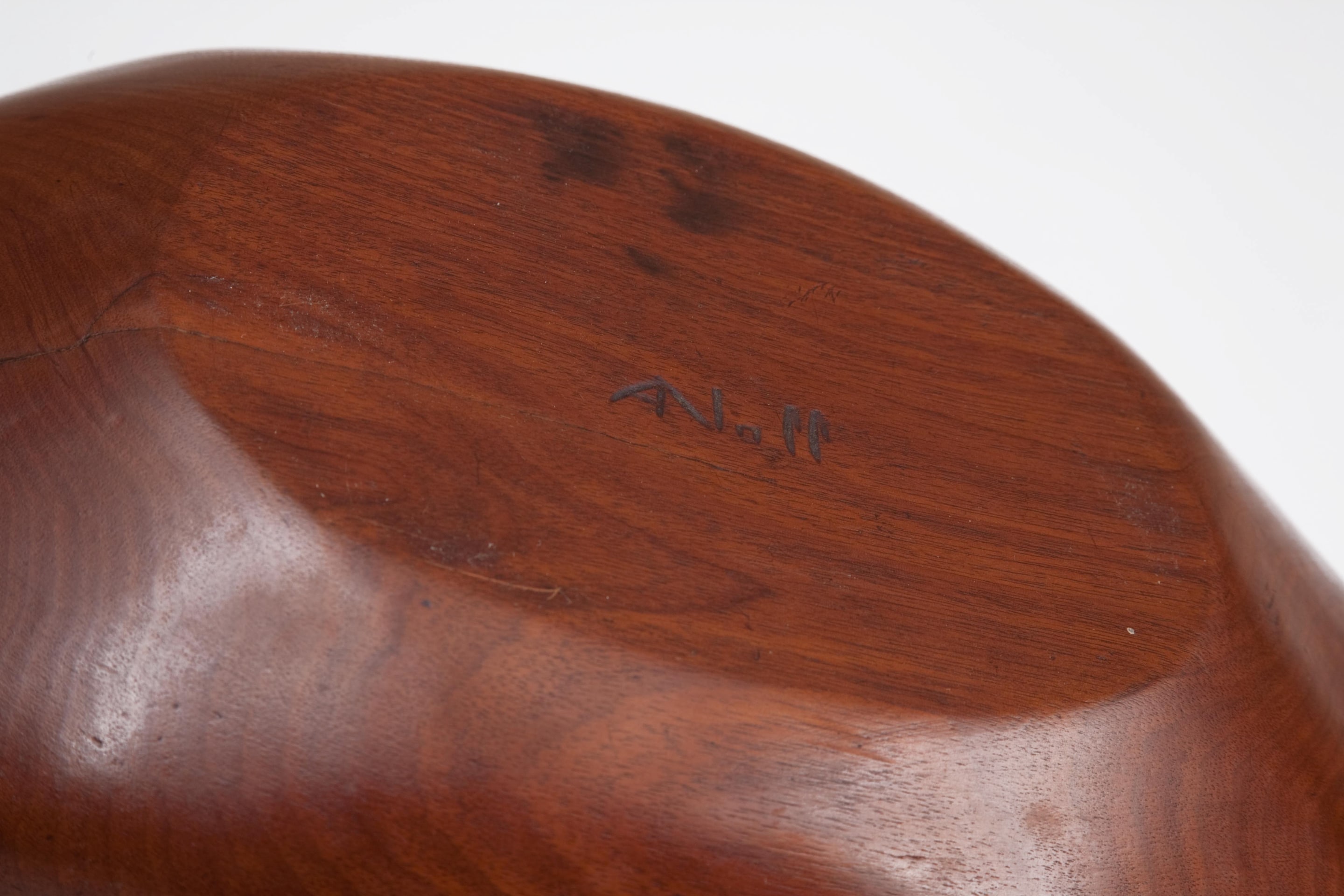 Alexandre Noll's large sculpted plate, view of signature underneath plate