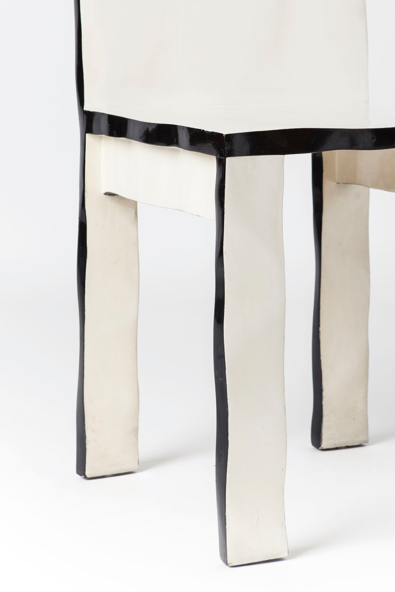 Howard Meister designer chair, detailed view of seat and legs