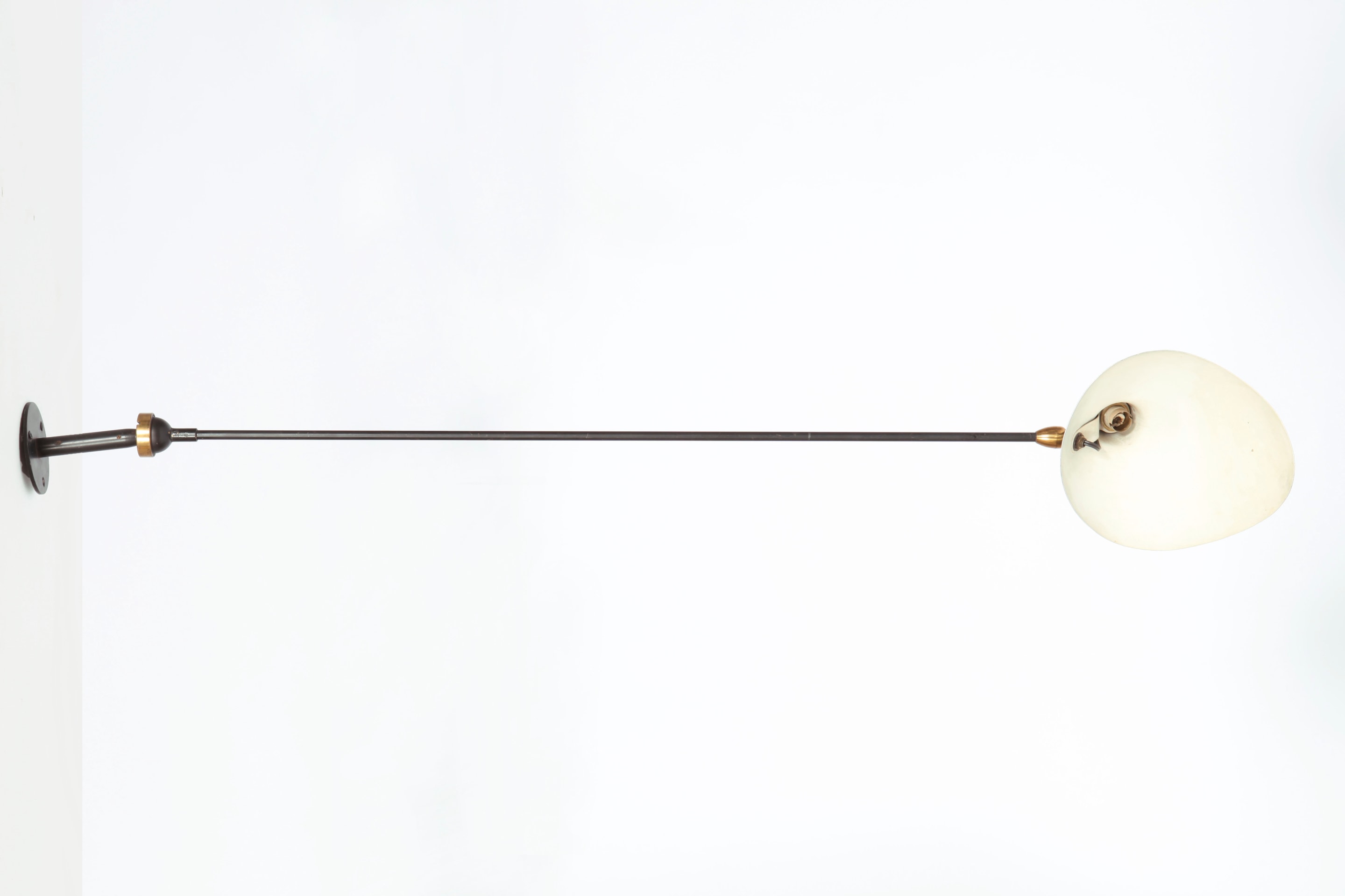 Serge Mouille's one arm sconce, front view