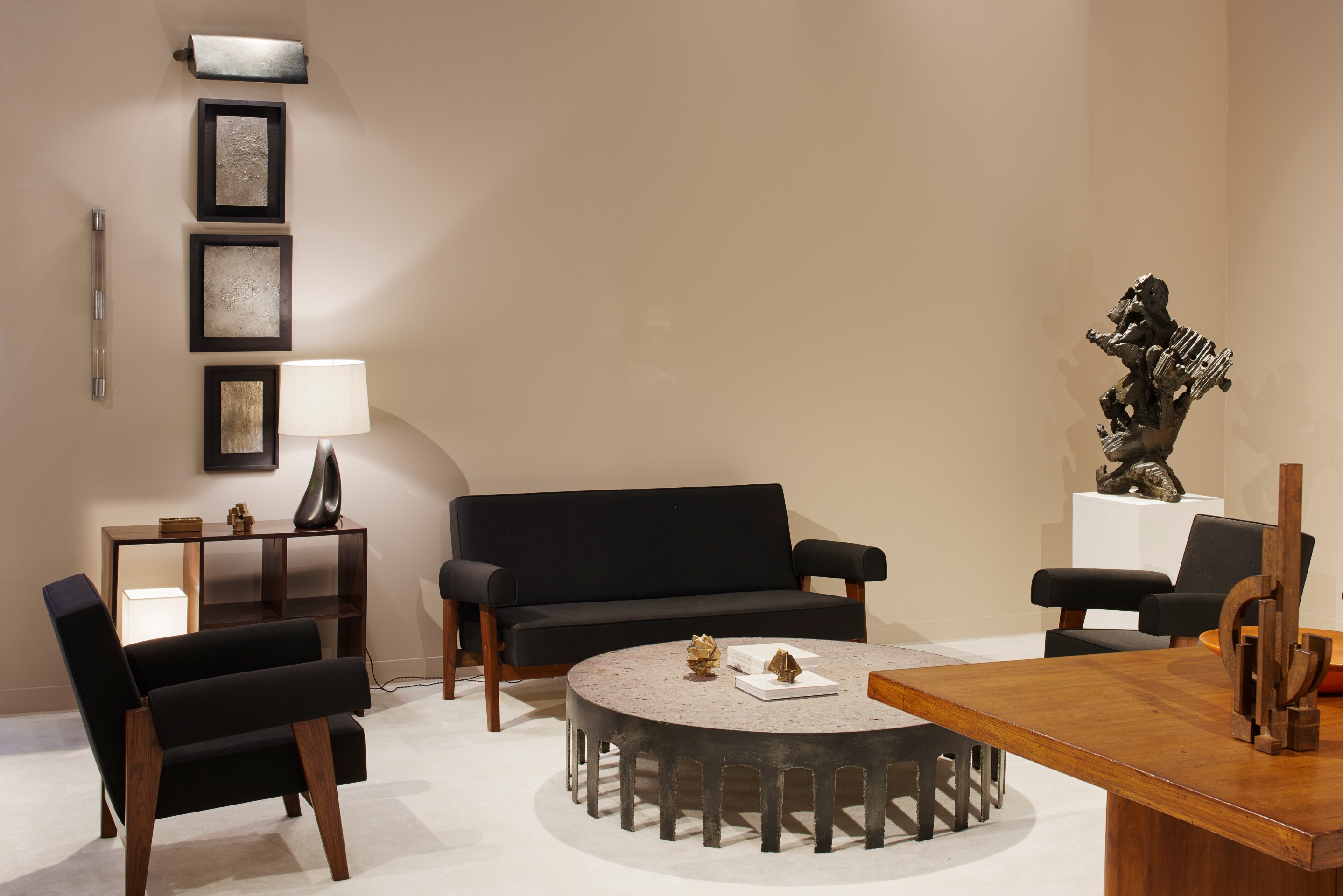 Magen H Gallery booth at Design Miami 2016, close up of a section with Pierre Jeanneret's &quot;Advocate and Press&quot; chairs and sofa and Pia Manu's coffee table