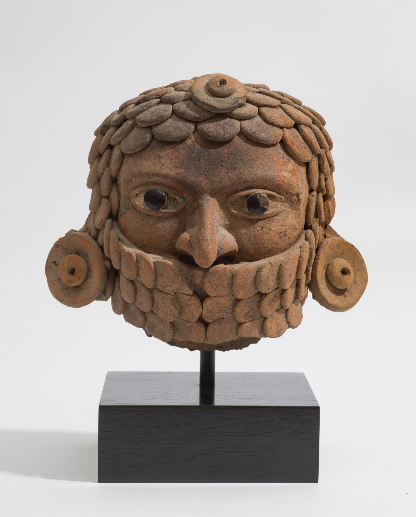 VERACRUZ Warrior Head wearing a Feathered Chin strap