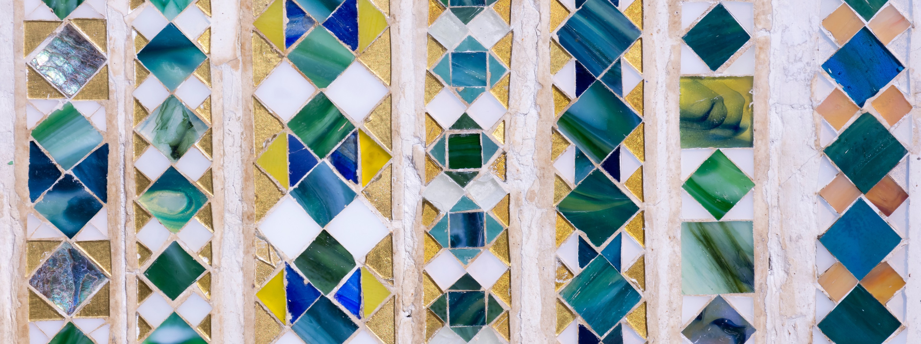 a section of decorative borders in geometric favrile glass tesserae, by tiffany studios, part of a larger panel on display in the tiffany mosaic showroom for clients to select for their designs