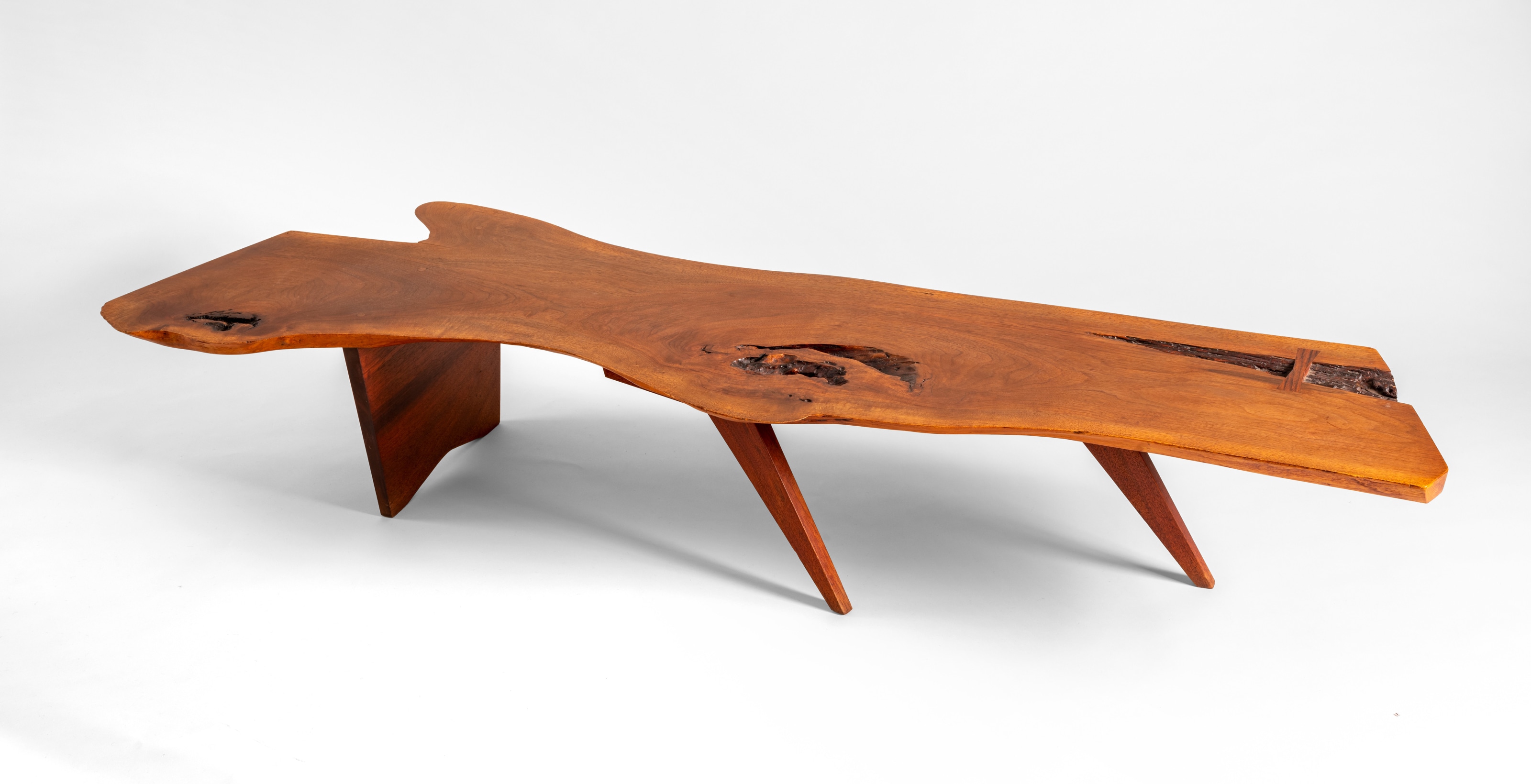 a long live edge coffee table by george nakashima