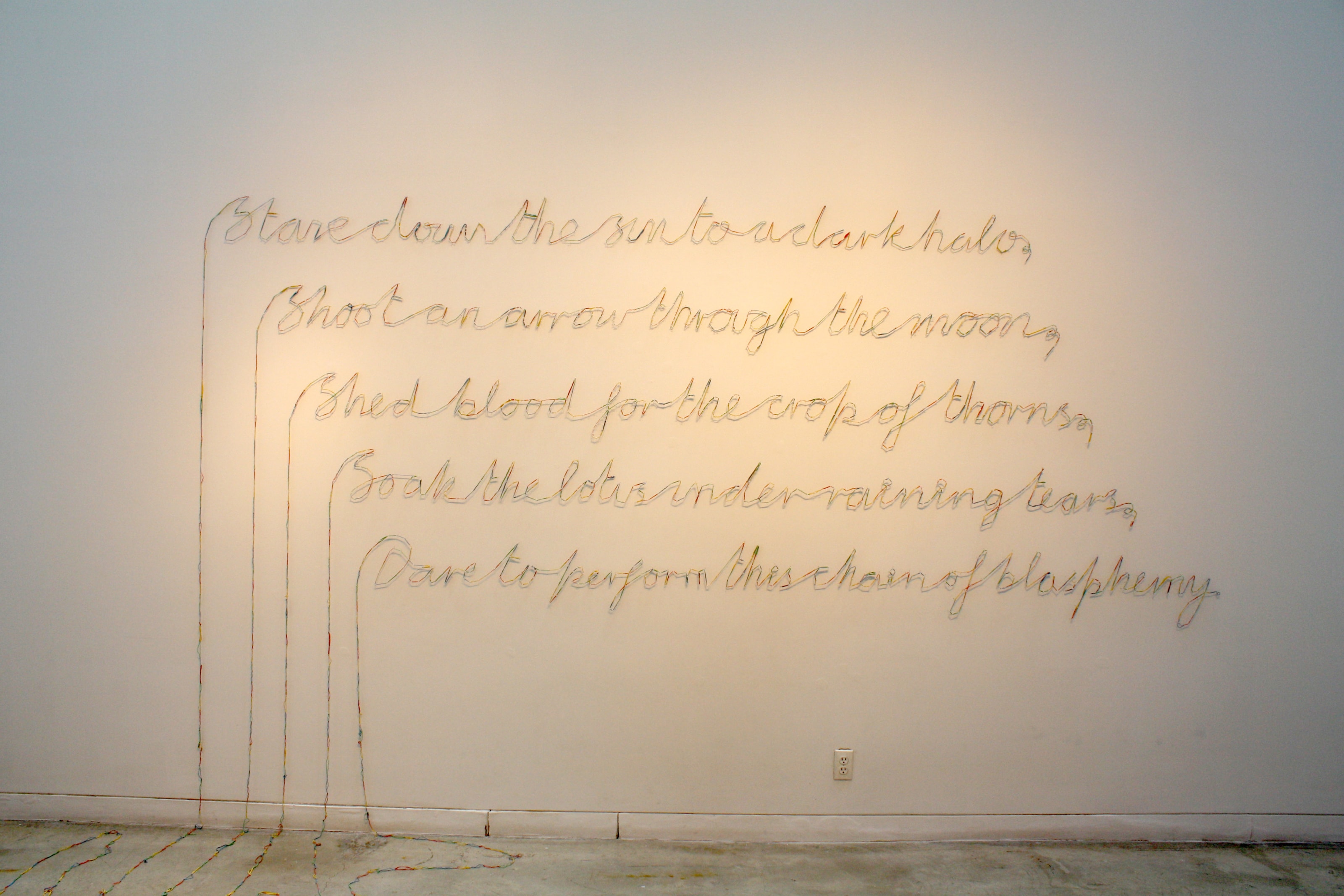 Abdullah M. I. Syed The Chained Blasphemy Hand-assembled multi-colored rubber band chain and dressmaker pins Dimensions variable 2013