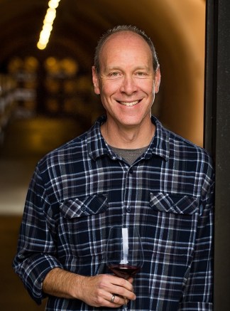 Marc Nanes in the oak barrel-filled caves of Kenzo Estate winery