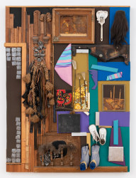 This is an image of a mixed media assemblage made by Noah Purifoy in 1989 titled: One White Paint Brush and a Pony Tail.