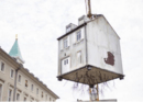 This House Dangling From A Construction Crane Is Art, Not An Accident