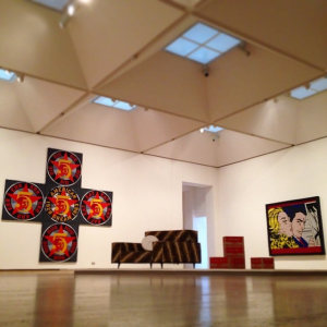 Installation view of Pop to Popism at the Art Gallery of New South Wales, Australia, including Indiana's painting The Demuth American Dream No. 5