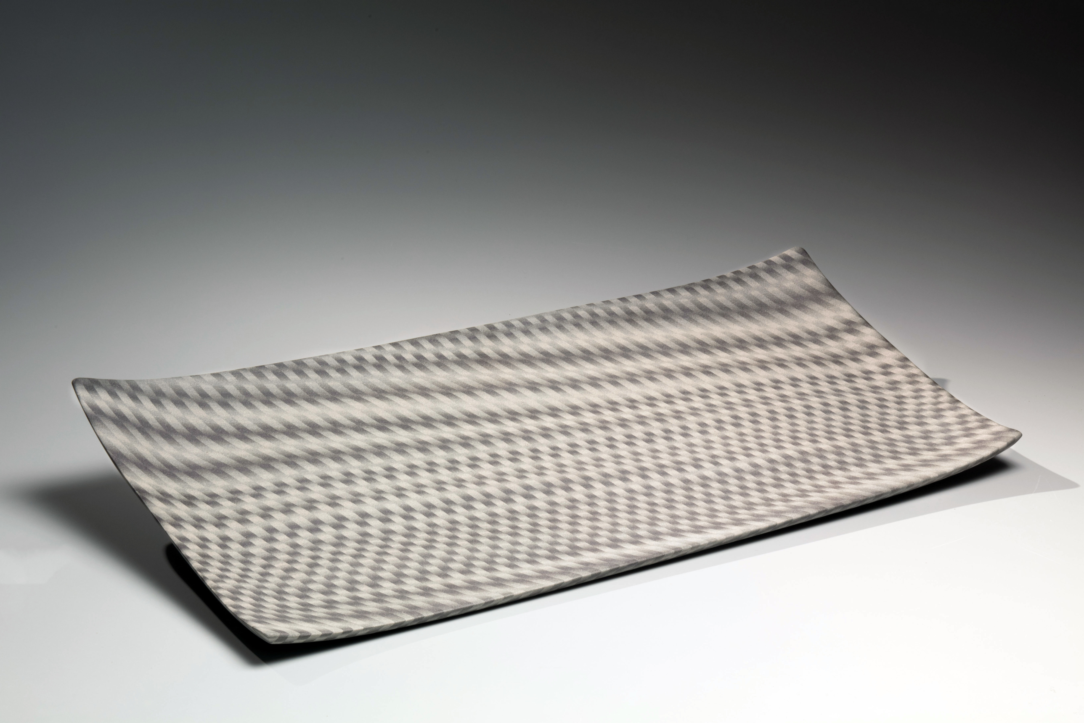 Rectangular plate with optical design of seemingly billowing curtains, 2006