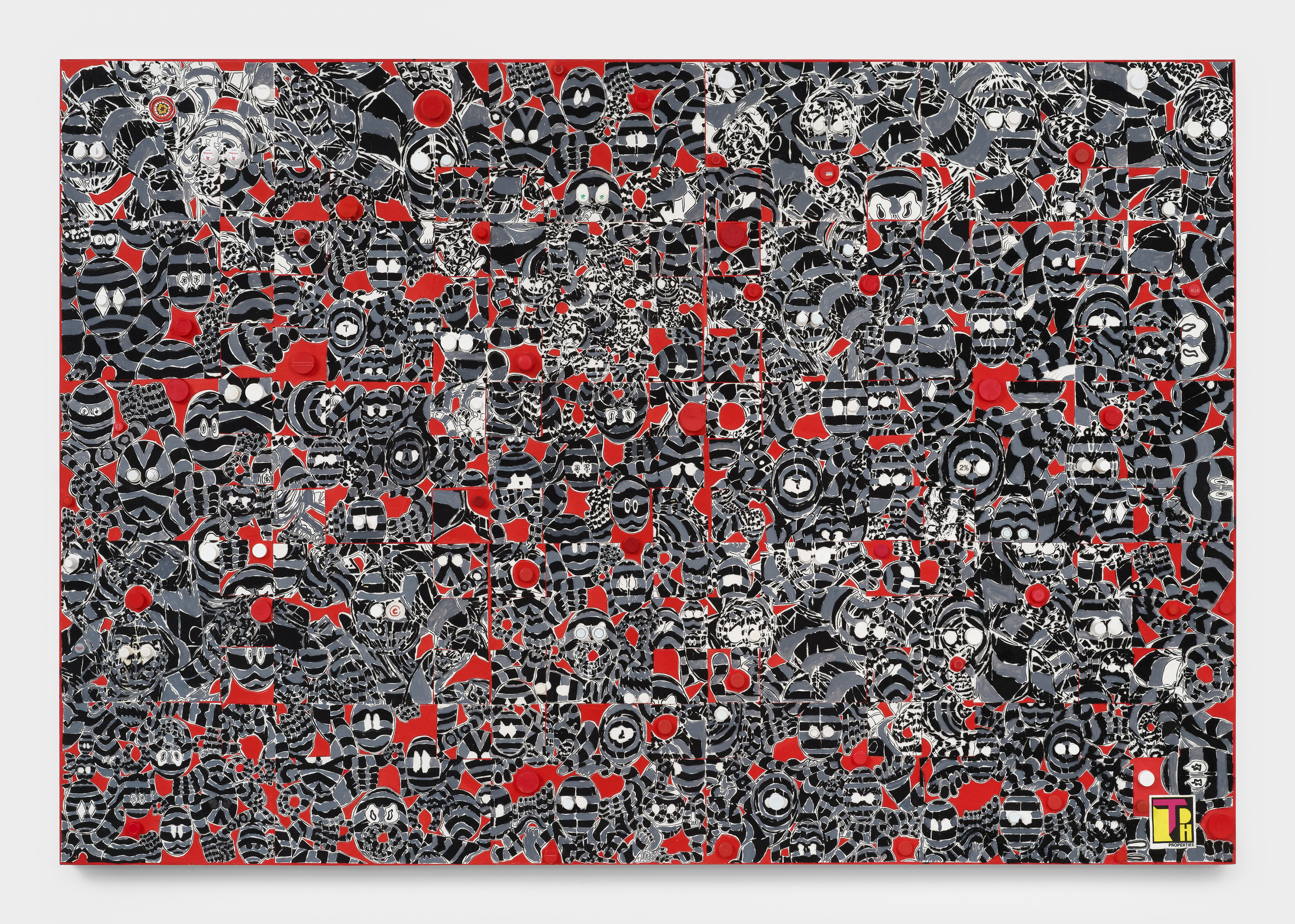 A painting of small striped black and grey faces against a red background with red bottle caps adhered to the canvas.