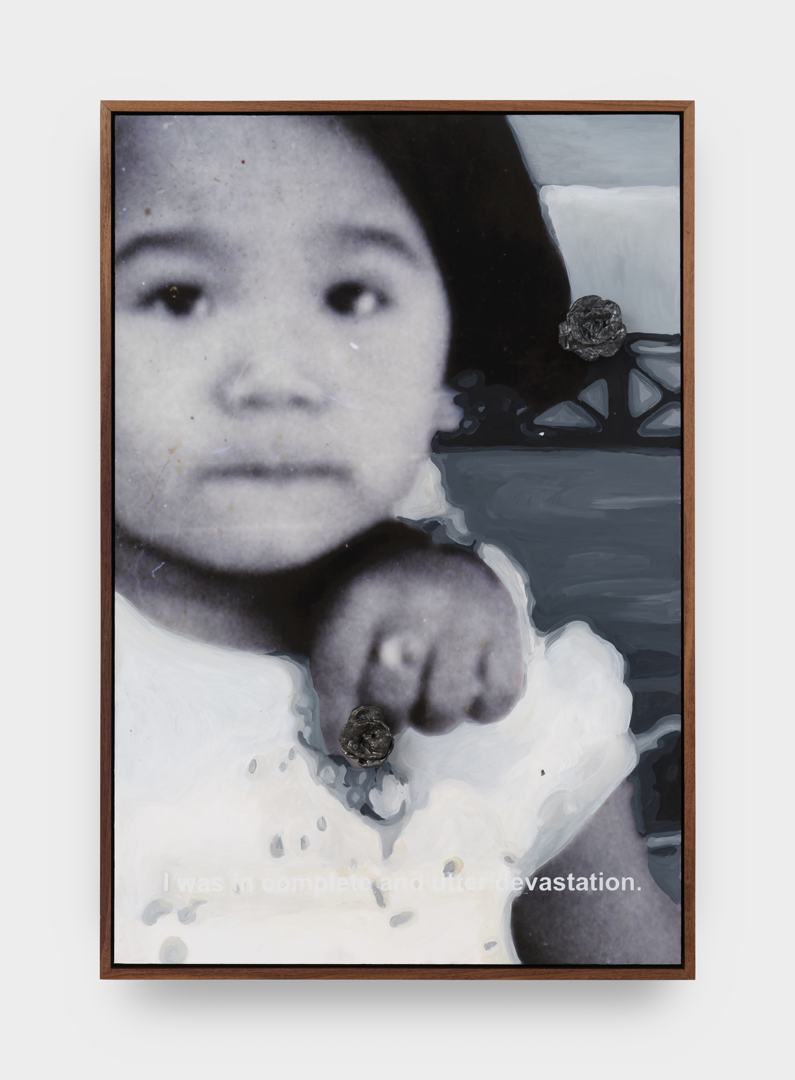 A digital printed photograph of a young girl in black and white with painted forms layered on top and a ceramic rose protruding from the picture plane