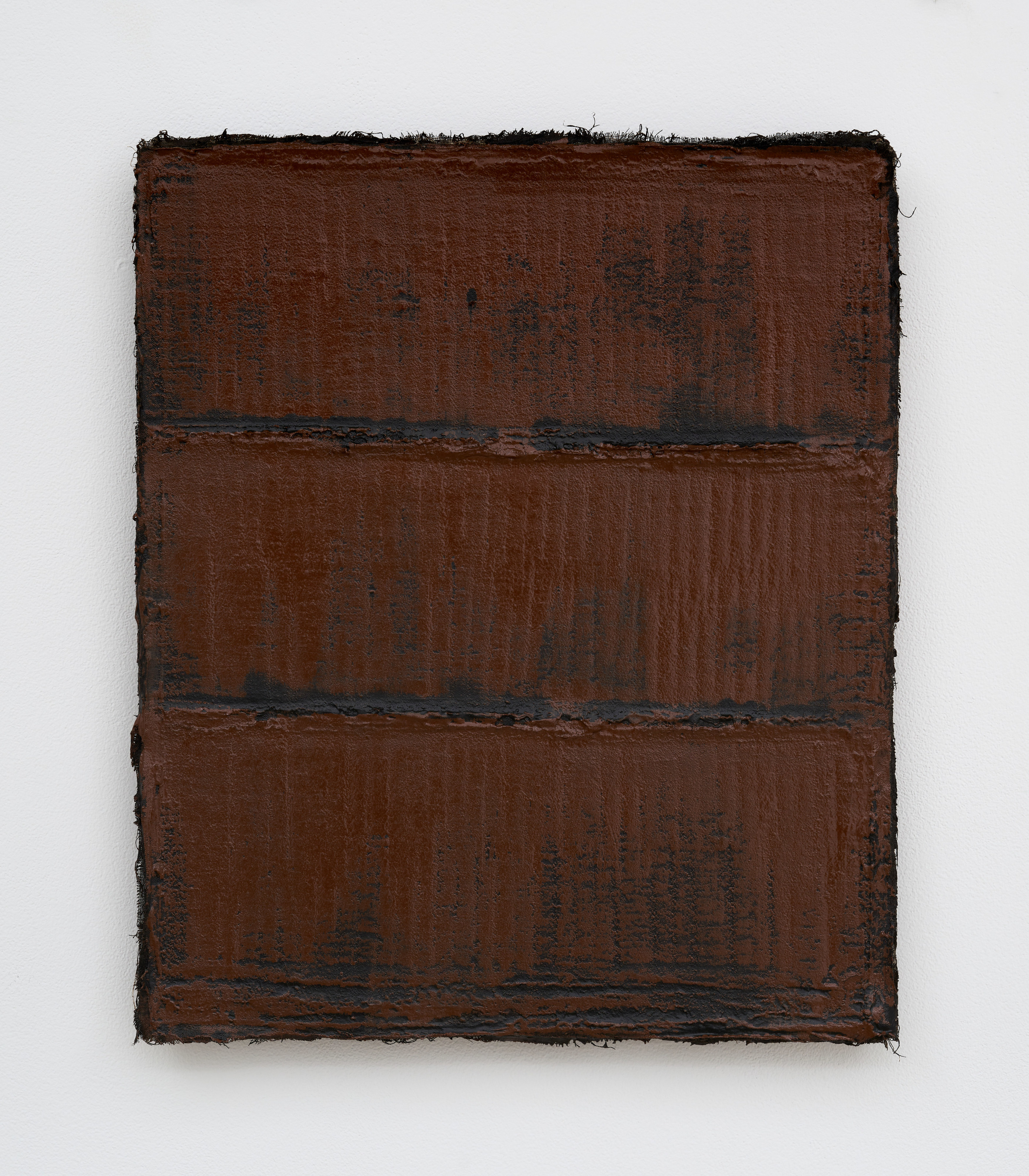 A rectangular textured painting with thick layers of brown pigment making horizontal lines.