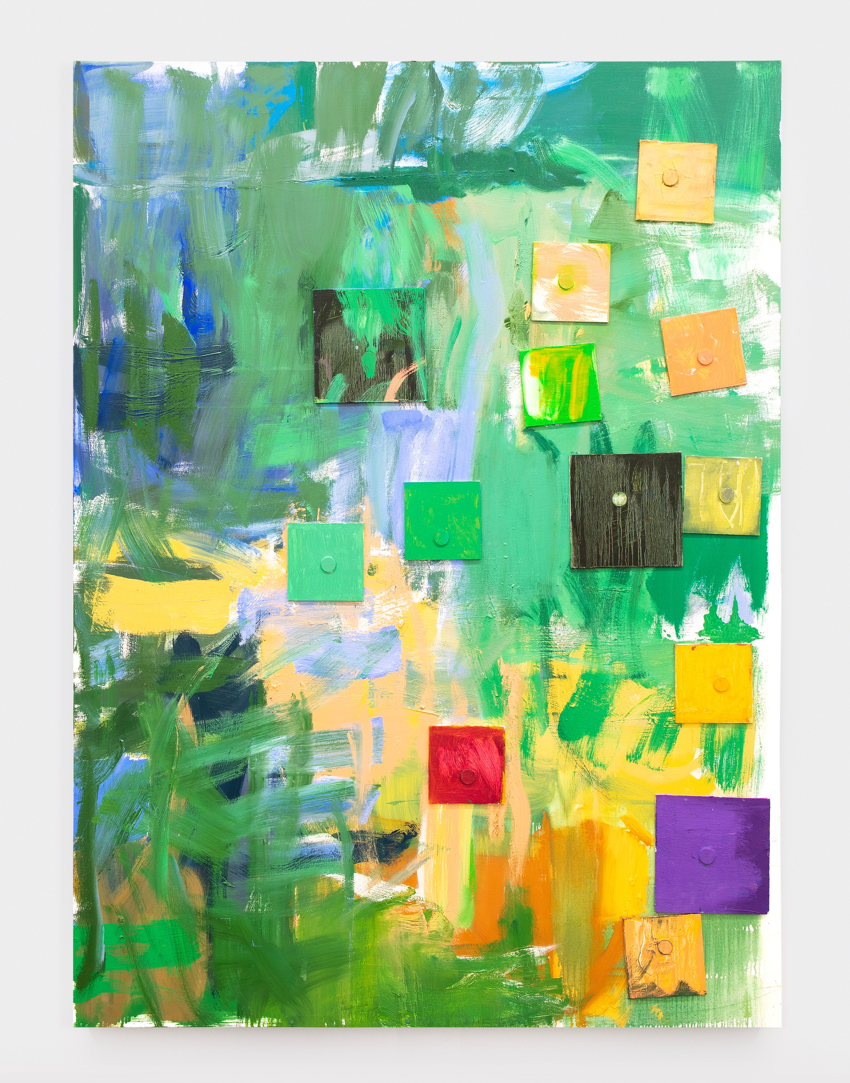 An abstract painting with swatches of yellow, green and blue pigment with purple, red, green, yellow and black squares of canvas magnetized to the frontal plane.