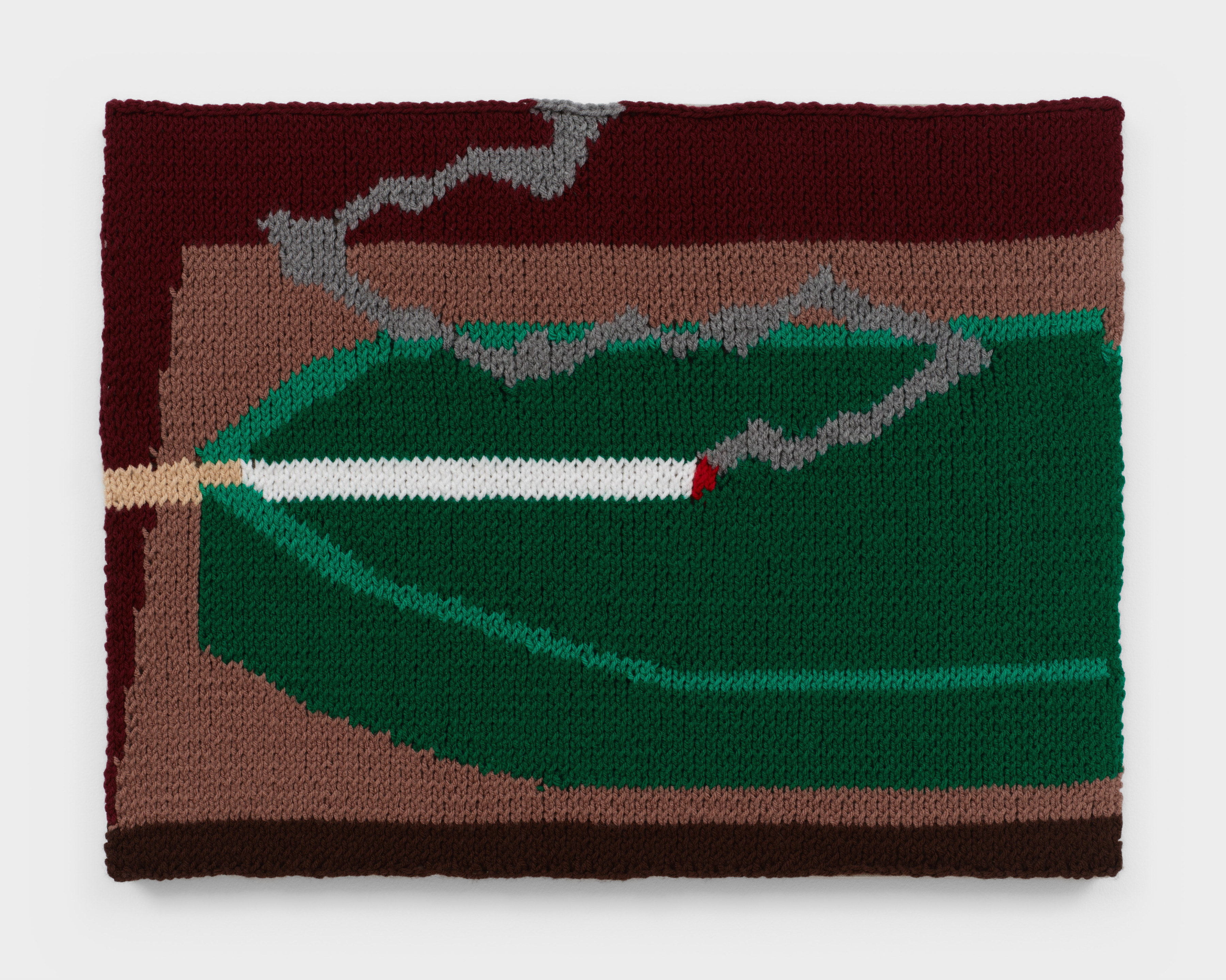 A knit artwork depicting a smoking cigarette in a green ashtray, sewn into linen and stretched.