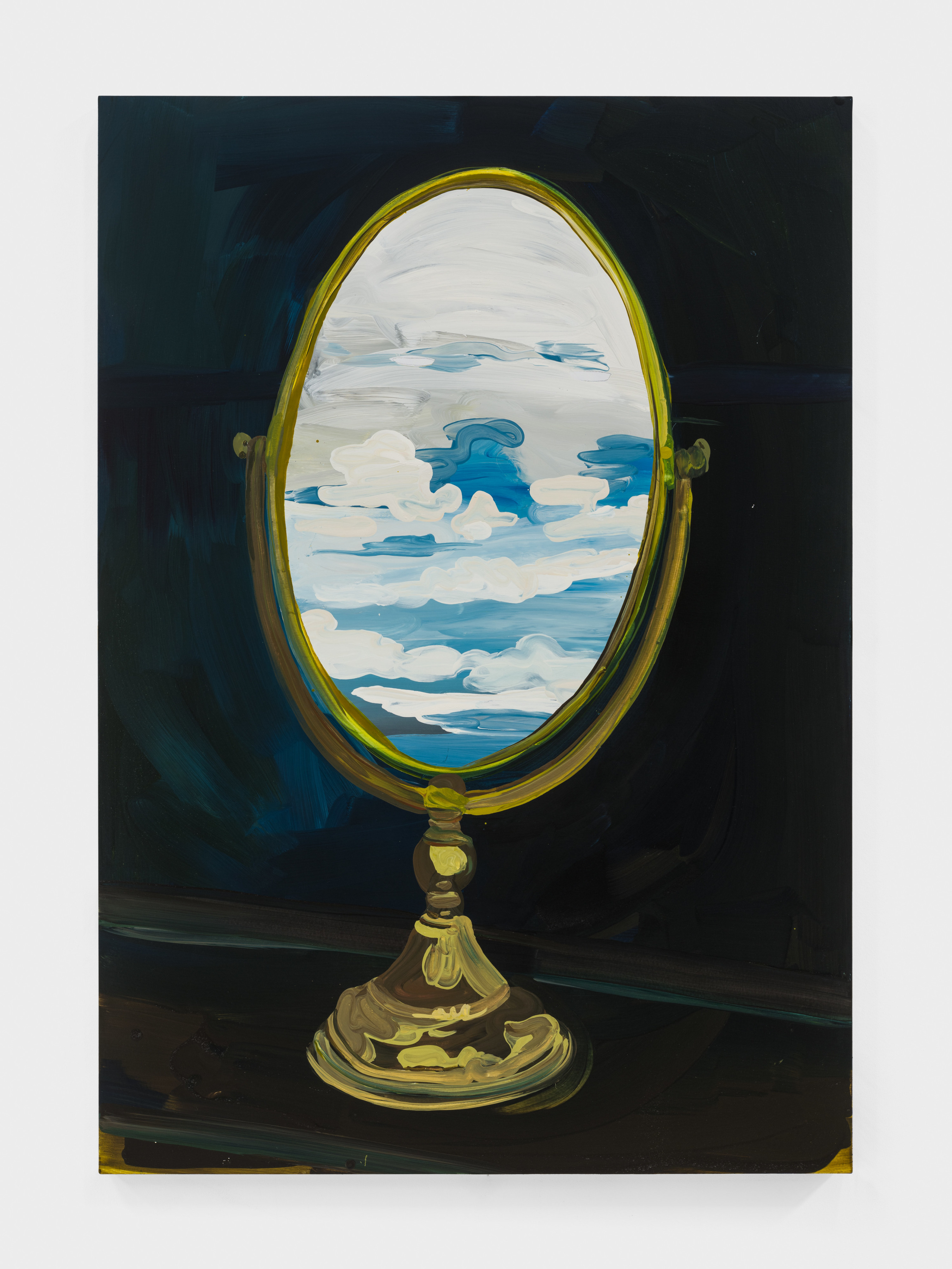 A vanity mirror sits titled and reflects a blue cloudy sky.