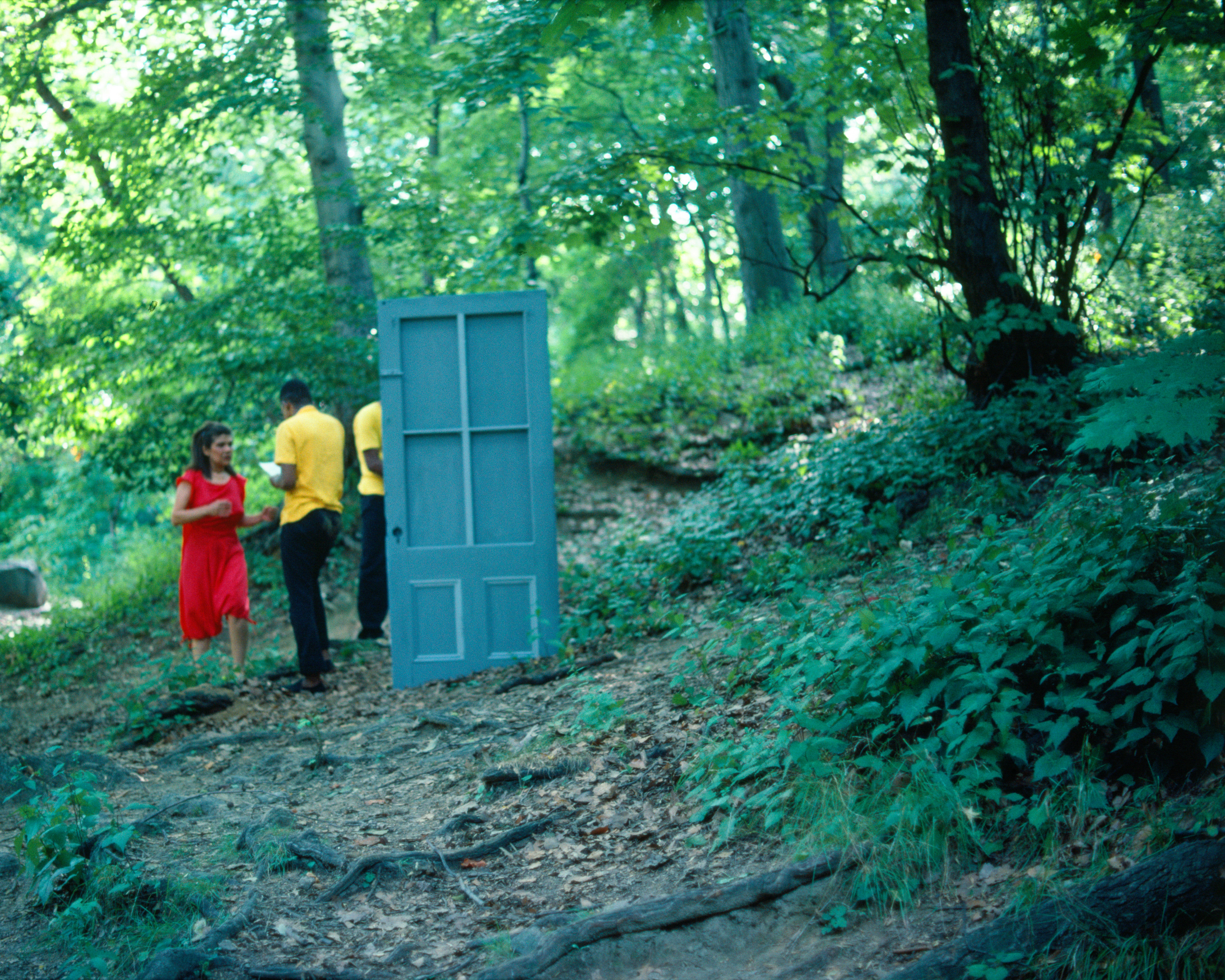 Rivers, First Draft: The Woman in Red tries to join the Black Male Artists but is ejected by them, 1982/2015, Digital C-print from Kodachrome 35mm slides in 48 parts, 16h x 20w in (40.64h x 50.80w cm)