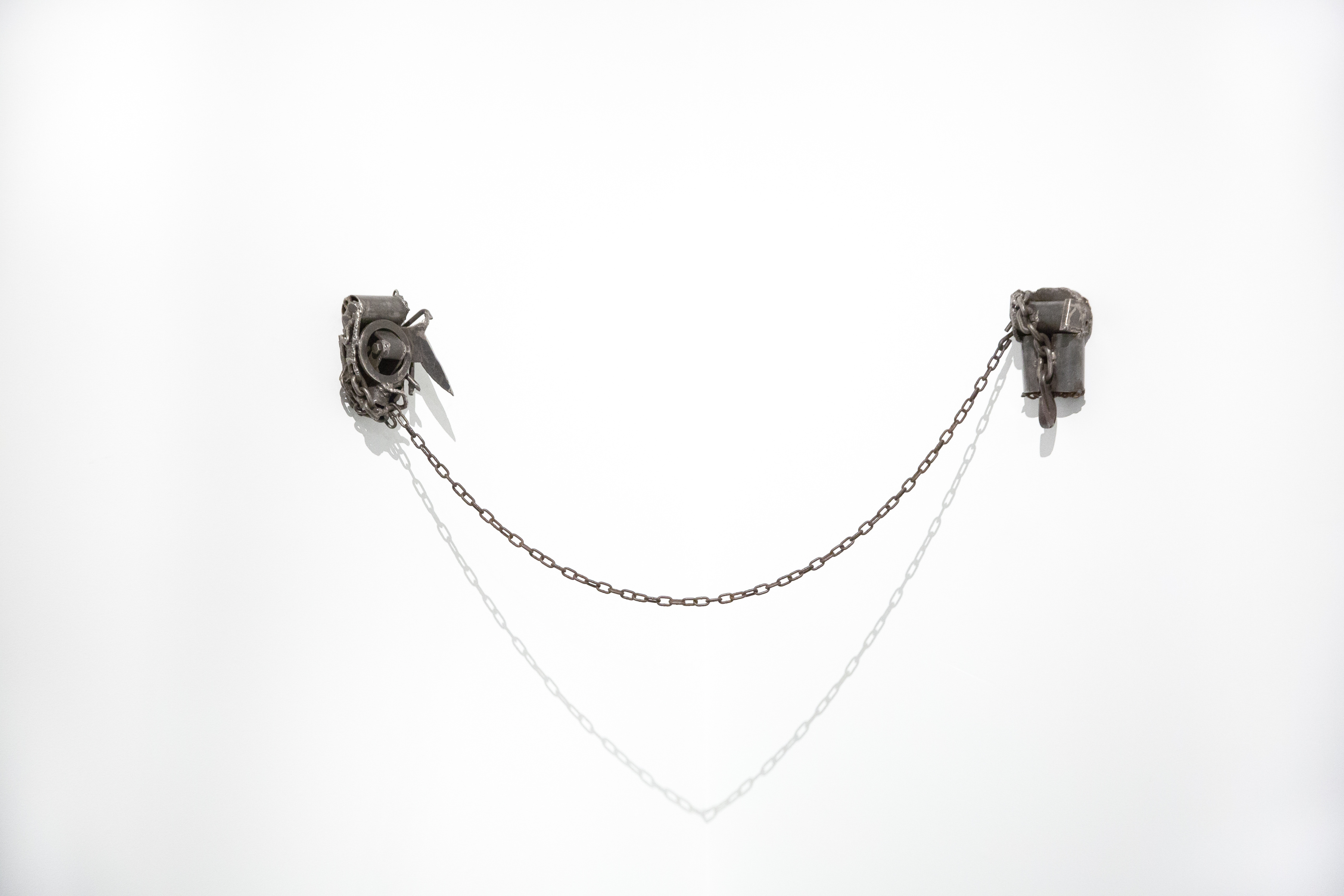 Two is One, 2016, welded steel and chain, dimensions variable
