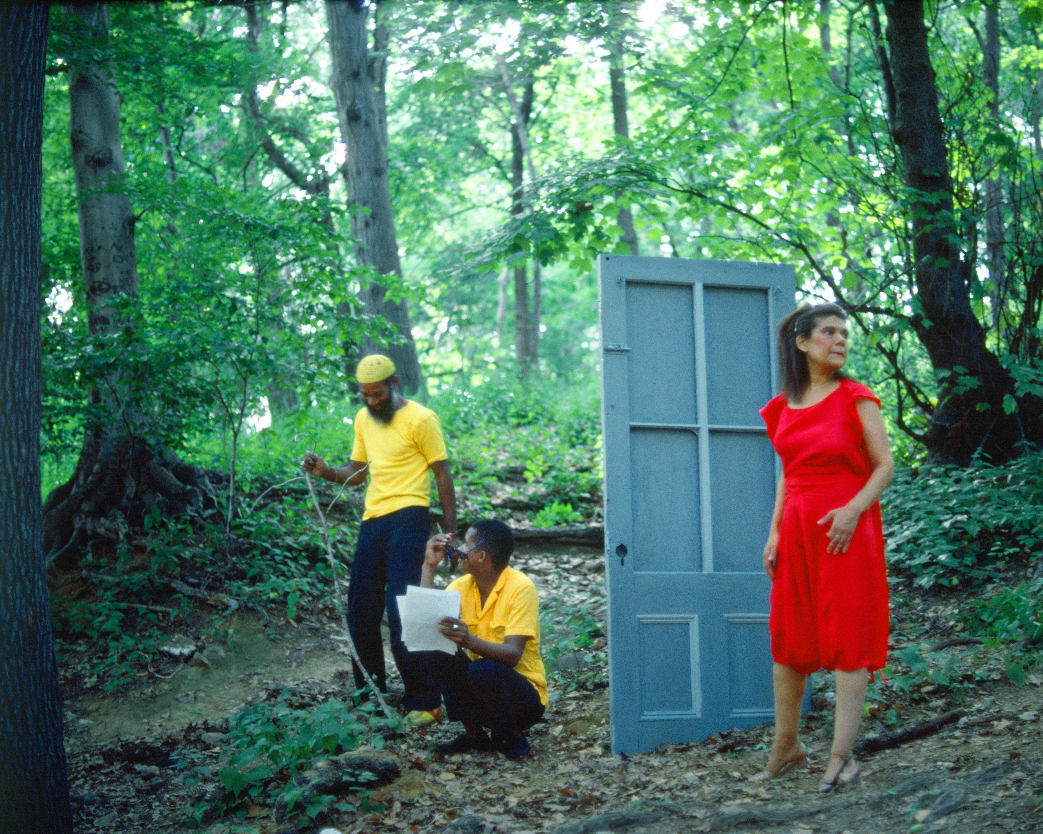 Lorraine O&#039;Grady, Rivers, First Draft: The Woman in Red hesitates outside after the Black Male Artists in Yellow eject her, 1982/2015