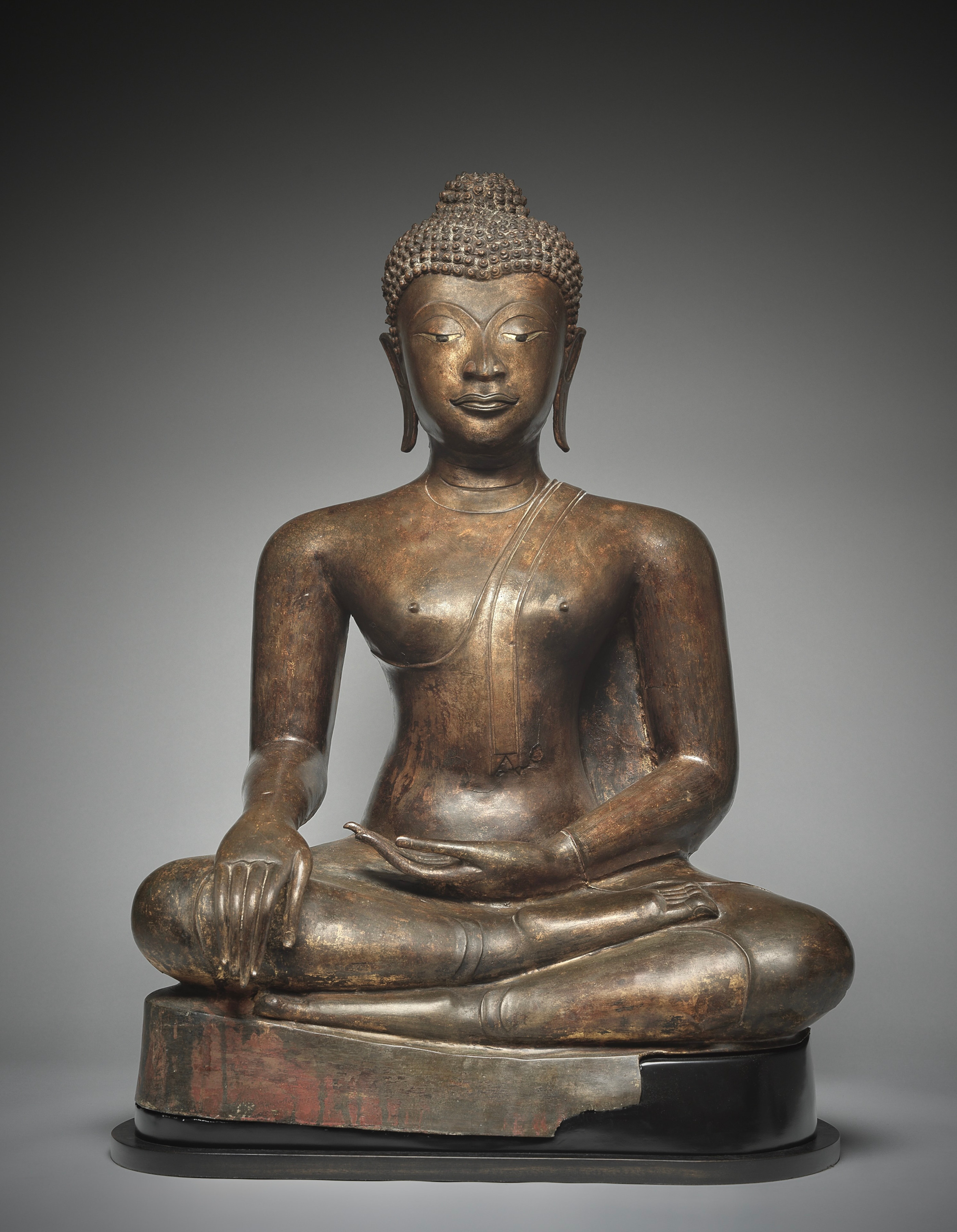 This impressive sculpture embodies the apogee of Thai Buddhist art from the 15th century