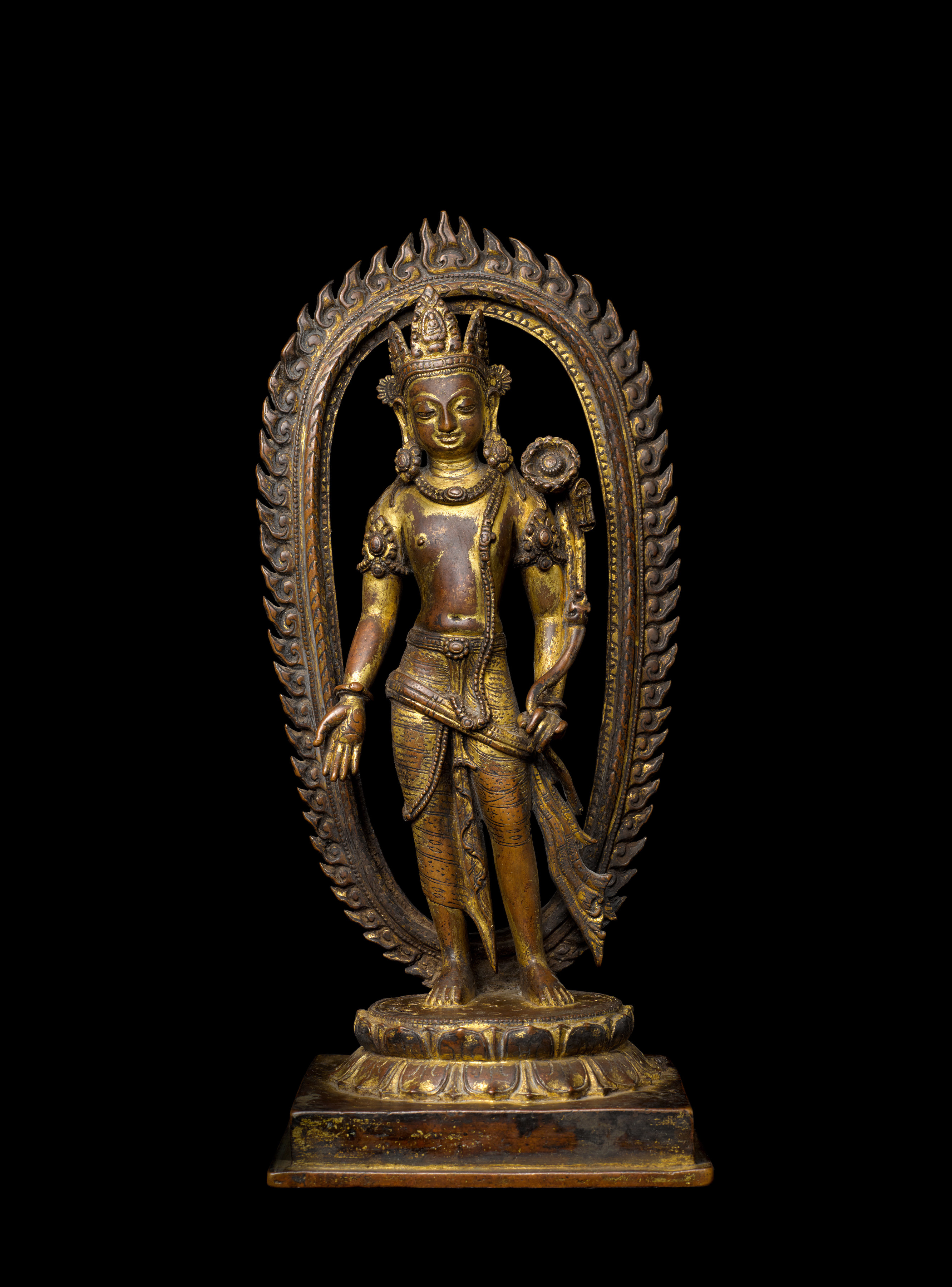 This figure of Padmapani is a fine and unusually complete example of a classic type of Nepalese sculpture that depicts standing bodhisattvas