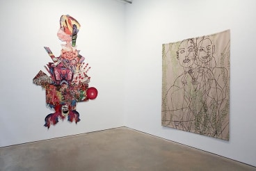 installation view of two tapestries